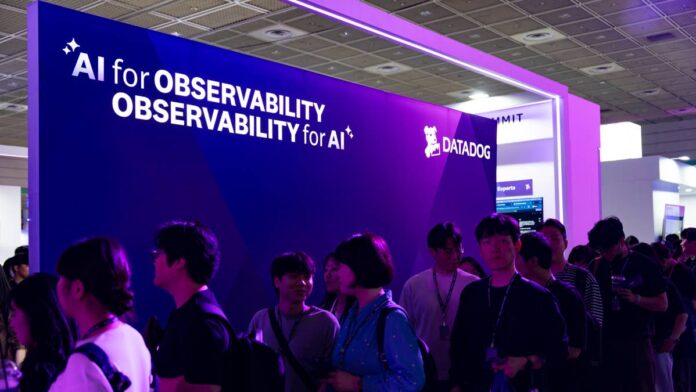 Datadog Inc. (<a href="https://www.thestreet.com/quote/DDOG">DDOG</a>) spent last summer defending itself against one accusation: that its biggest customer was quietly building its way out the door.In July 2025, <a href="https://www.cnbc.com/2025/07/07/stock-market-today-live-updates.html">Guggenheim downgraded the stock to sell</a>, warning that OpenAI was developing in-house monitoring tools that could carve a <strong>$150 million</strong> hole in Datadog’s revenue. The stock brushed it off and nearly doubled over the following year.On August 6, the warning arrived anyway, delivered not by a bearish analyst but by Datadog’s own management.The company <a href="https://investors.datadoghq.com/news-releases/news-release-details/datadog-announces-second-quarter-2026-financial-results/">beat second-quarter revenue and earnings estimates</a> and raised its full-year guidance for a third straight quarter. Investors sold the stock down as much as <strong>19%</strong> the same day, according to <a href="https://www.fool.com/coverage/stock-market-today/2026/08/06/stock-market-today-aug-6-datadog-plummets-19-leading-software-stock-slide/">The Motley Fool</a>.<strong><a href="https://www.thestreet.com/investing/stocks/datadogs-largest-customer-renews-deal-but-cuts-usage">Related: Datadog’s largest customer renews deal but cuts usage</a></strong>The reason wasn’t the quarter that just happened. It was the one ahead of it. Datadog told investors its unnamed largest customer, widely believed by analysts to be OpenAI, would pull back usage starting in the third quarter, despite recently signing a nine-figure renewal covering 17 products, <a href="https://www.benzinga.com/markets/earnings/26/08/61033569/datadog-beat-earnings-raised-guidance-but-ddog-stock-still-plunged-19-as-wall-street-says-it-all-comes-down-to-one-customer">Benzinga reported</a>.Bank of America read the same guidance and reached a different conclusion. Analysts Koji Ikeda and George McGreehan reiterated their <strong>buy rating</strong> and <strong>$305</strong> price objective in a note to clients that was shared with TheStreet, arguing the market is treating one account’s slowdown as a company-wide problem.That target implies <strong>33%</strong> upside from where the stock closed after the selloff.The stock sold off for a reason that’s mostly already overThe scariest figure in Datadog’s guidance is a growth rate. The more useful figure is a dollar amount, and it’s the one BofA’s note focused on.Third-quarter guidance implies roughly <strong>$19 million</strong> of new revenue beyond what the company just booked, compared with <strong>$115 million</strong> of new revenue added in the second quarter alone.That’s close to a six-fold drop in pace within a single quarter, on paper. BofA’s read is that management built maximum caution into the number around one customer’s <a href="https://www.thestreet.com/dictionary/p/pullback">pullback</a> rather than a broad slowdown.On the third quarter guidance <a href="https://www.thestreet.com/dictionary/e/earnings-call">earnings call</a>, CEO Olivier Pomel put it simply: the company doesn’t control what happens with a specific customer, <a href="https://www.benzinga.com/markets/earnings/26/08/61033569/datadog-beat-earnings-raised-guidance-but-ddog-stock-still-plunged-19-as-wall-street-says-it-all-comes-down-to-one-customer">Benzinga reported</a>. That framing turns an alarming growth number into a bounded, known risk instead of an open-ended one.
BofA reiterated its $305 Datadog price target even after a single AI customer’s usage pullback triggered a 19% stock selloff.<a href="https://www.gettyimages.com/detail/2276728655">NurPhoto / Getty Images</a>
Datadog’s business outside its biggest customer is getting strongerThe detail overshadowed by the selloff is that growth outside Datadog’s largest account has now accelerated for four straight quarters, reaching the <strong>high-20% range</strong>, according to BofA’s note.That trend predates this year’s <a href="https://www.thestreet.com/tag/artificial-intelligence">AI</a> spending surge and instead reflects customers consolidating monitoring tools onto a single platform.Customers paying Datadog at least <strong>$100,000</strong> a year grew <strong>23%</strong> year over year, up from 21% growth the prior quarter, according to <a href="https://investors.datadoghq.com/news-releases/news-release-details/datadog-announces-second-quarter-2026-financial-results/">Datadog’s earnings release</a>.That acceleration came from a base of roughly 4,720 large accounts, not from one AI lab.BofA’s view is that this breadth undercuts the bear case that Datadog is simply riding one customer’s AI spending wave. The firm called the concentration <strong>overhang de-risked</strong> rather than resolved, a distinction that matters for anyone deciding whether to buy the drop.<strong>More BofA:</strong><a href="https://www.thestreet.com/investing/stocks/bofa-micron-china-ai-threat"><strong>BofA downplays China’s threat to Micron’s AI business</strong></a><a href="https://www.thestreet.com/investing/stocks/nvidia-vs-amd-ai-chips-bofa-analysis"><strong>Nvidia dominates AI chips, but BofA sees AMD closing in</strong></a><a href="https://www.thestreet.com/investing/stocks/fastly-akamai-cloudflare-bofa-ratings"><strong>BofA refuses to embrace cybersecurity darling ahead of earnings</strong></a>BofA’s price target didn’t move, and that’s the tellBofA set its <strong>$305</strong> price objective on July 22, weeks before the earnings report, according to the note’s coverage history.The fact that Wednesday’s guidance didn’t budge that number is itself informative: the firm is signaling it had already modeled this scenario.The target rests on a 20.6x multiple of Datadog’s expected 2027 revenue, versus roughly 5x for infrastructure software peers including MongoDB, Snowflake, and Dynatrace.BofA justifies the premium with Datadog’s projected <strong>19%</strong> revenue growth in 2027, against an <strong>11%</strong> peer average. That’s a rich multiple, and it means the stock still has to earn that gap through execution, not just survive one customer’s retreat.A single customer can now move an entire sector’s stock priceDatadog’s selloff previews a risk every AI-infrastructure vendor increasingly shares. A handful of AI labs and hyperscalers have grown large enough that their internal build decisions can swing a <a href="https://www.thestreet.com/dictionary/p/public-company-publicly-traded">public company</a>’s quarterly growth rate by double digits.Observability, cloud data, and adjacent software vendors all carry some version of the concentration math investors just repriced into Datadog.The next few quarters will show whether Datadog’s other <a href="https://investors.datadoghq.com/news-releases/news-release-details/datadog-announces-second-quarter-2026-financial-results/">4,700-plus large customers</a> can grow fast enough to make one account’s habits irrelevant to the stock.If they can, this selloff becomes the <strong>buying opportunity</strong> BofA is calling it. If they can’t, Guggenheim’s year-old downgrade will look less like a bad call and more like an early one.<strong><a href="https://www.thestreet.com/investing/sandisk-stock-bofa-reiterates-buy-earnings-call">Related: Bank of America doubles down on Sandisk stock after earnings</a></strong>