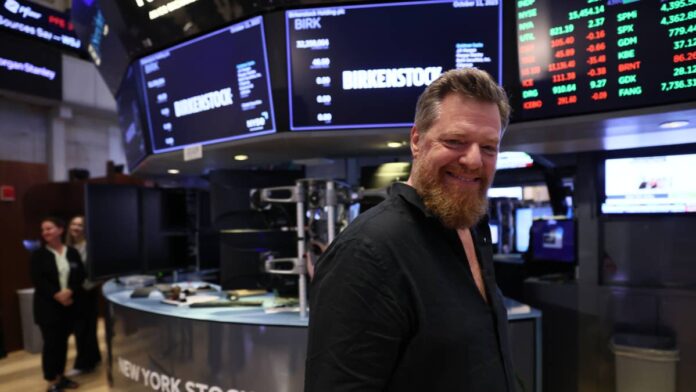 Michael Burry is famous for making bets that look strange before they look obvious.
His latest one may be his most personal.
The investor most famous for <a href="https://stocktwits.com/news-articles/markets/equity/birk-stock-rises-overnight-michael-burry-says-he-s-been-a-proud-birkie-since-87-and-now-owns-5-2-of-birkenstock/cZt3N10RJxx">forecasting the collapse</a> of the U.S. housing market says he has boosted his position in <strong>Birkenstock Holding (BIRK)</strong> to 5.2%, placing a big bet on over four decades of devotion to the German shoe maker.
Burry has been wearing Birkenstocks since 1987 and recently dubbed the brand his favorite shoe since high school.
But nostalgia alone cannot explain the investment.
Birkenstock reported €720 million in fiscal third-quarter revenue, up 13% year-over-year, and raised its full-year growth forecast. Even as tariffs and foreign exchange pressure margins, the company is increasing direct-to-consumer sales and buying back stock.
That makes Burry’s gamble more fun.
He could be wagering that one of the market’s oldest consumer brands has a lot longer runway for development than investors believe.
Michael Burry turns a 40-year habit into a major investment
Burry’s affiliation with Birkenstock is older than his financial career.
He wrote recently that he has been a “Proud Birkie since ’87” and said in an earlier post that he has bought the shoes for roughly 40 years without noticing a decline in quality.
That history is important since it seems Burry is considering product durability as part of the investing argument.
In an Aug. 21 Substack post, he stated he added to his position when shares dipped below the $35 level, bringing his stake to 5.2%.
<strong><a href="https://www.thestreet.com/investing/stocks/birkenstock-stock-price-plunges-to-32-44-as-luxury-bet-unravels">Related: Birkenstock stock price slumps as luxury dream unravels</a></strong>
That is a typical set-up for a contrarian investor.
Shares of Birkenstock are down about 17% this year, according to Stocktwits, despite the company’s solid operational performance.
That’s the disconnect that Burry is typically looking for: a firm demonstrating resiliency while the stock price is exhibiting increasing doubt.
Birkenstock’s last quarter bolstered that argument.
Fiscal third-quarter revenue <a href="https://www.thetimes.com/business/companies-markets/article/birkenstock-raises-forecast-sales-demand-sandals-0wfpnwmcp">rose 13% on a reported basis</a> and 15% in constant currency to €720 million. Direct-to-consumer revenue increased 14%, while business-to-business revenue rose 13%.
Birkenstock is growing despite pressure on margins
Perhaps the best part of the quarter was what management did next.
Birkenstock revised its revenue-growth projection for fiscal 2026 to 15% on a constant-currency basis and now anticipates reported sales at the high end of its prior €2.3 billion to €2.35 billion range. Adjusted EBITDA is estimated to be at least €710 million.
Growth is also geographically spread out.
Revenue grew 11% in the Americas, 15% in Europe, the Middle East and Africa and 18% in Asia-Pacific on a reported basis. Asia Pacific growth was 23% in constant currency.
That’s not to say the firm isn’t under pressure.
Gross margin <a href="https://www.sec.gov/Archives/edgar/data/1977102/000119312526347762/birk-ex99_1.htm">declined to 59.1% from 60.5%</a> a year earlier, partially reflecting foreign-exchange impacts and increased U.S. tariffs. Net profit declined to €110 million, a fall of 15%, while adjusted net profit was up 15%.
Birkenstock was so confident that it completed a €230 million accelerated share buyback in the quarter, decreasing its outstanding share count by almost 6 million shares.
That mix might be more important to Burry than short-term margin pressure.
The company is still growing at a double-digit rate, still generating strong margins, and is actively returning capital while its shares trade well below previous highs.
Michael Burry bets big on Birkenstock<a href="https://www.gettyimages.com/detail/1739118665">Jemal Countess / Getty Images</a>
Wall Street is starting to warm to Birkenstock again
Burry isn’t the only investor becoming more positive.
Telsey Advisory Group boosted its price objective on Birkenstock to $50 from $45, while keeping an Outperform rating on the company, Stocktwits said.
Bernstein likewise upped its target to $55 from $50 but maintained a Market Perform rating, citing growing confidence in the brand.
<strong>More Retail:</strong>
<a href="https://www.thestreet.com/retail/home-depot-expands-express-delivery"><strong>Home Depot is making a big bet on cautious consumers</strong></a>
<a href="https://www.thestreet.com/retail/another-state-just-banned-a-controversial-retail-pricing-practice"><strong>Another state just banned a controversial retail pricing practice</strong></a>
<a href="https://www.thestreet.com/retail/jpmorgan-fertilizer-report-grocery-prices"><strong>JPMorgan just flagged a slow-build food crisis</strong></a>
The market’s response to Birkenstock’s last quarter was noteworthy, too.
Its shares <a href="https://www.reuters.com/business/retail-consumer/birkenstock-raises-annual-revenue-forecast-2026-08-13/">surged almost 15%</a> after the business lifted its forecast but remained below its 2024 top, Reuters said.
That shows investors are starting to disconnect the softer stock sentiment from underlying customer desire for the brand.
Burry’s Birkenstock bet is really about durability
The easy headline is that Burry likes Birkenstocks.
The more interesting story is why he is ready to control so much of the corporation behind them.
Birkenstock has built its brand for centuries on product consistency, comfort and recognized design. The firm claims to have been founded in 1774 and assembles more than 95% of its goods in Germany.
Burry’s statements show he thinks stability is a good thing, economically.
For the moment, the company’s metrics make its case: double-digit growth, improved outlook, and ongoing demand at full price even with tariffs and currency impact.
That doesn’t mean the stock is risk-free. Margins are being squeezed, purchasing might drop down, and fashion companies can lose their glamor fast.
But Burry seems to be banking that Birkenstock is more than a passing craze.
He’s been wearing those shoes for over four decades and is now putting some considerable money behind that confidence.
<strong><a href="https://www.thestreet.com/investing/stocks/michael-burry-warns-palantir-stock-investors-bear-case">Related: Michael Burry sends a strong warning to Palantir stock investors</a></strong>
