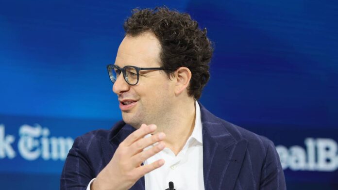 On June 12, Amazon engineers handed a report to the U.S. Commerce Department. Within hours, two of Anthropic's newest <a href="https://www.thestreet.com/tag/artificial-intelligence">AI</a> models <a href="https://www.thestreet.com/technology/anthropic-white-house-ai-security-scare-regulations">went offline for every user</a> on the planet. Nineteen days later, Anthropic got them back.The return of Claude Fable 5 to global availability on July 1 is the result of two weeks of Washington negotiations, a new safety classifier, and an industry jailbreak framework Anthropic built alongside Amazon, Microsoft, and Google. How Anthropic got from that shutdown to this resolution tells a specific story about where the company stands in 2026.<strong>What triggered the 19-day Fable 5 ban and how Anthropic ended it</strong>The June 12 export control directive came after <a href="https://www.thestreet.com/technology/amazon-ceo-just-made-things-uncomfortable-for-anthropic">Amazon researchers</a> found a method of prompting Fable 5 to identify software vulnerabilities and, in one case, produce code showing how one could be exploited. They reported it to the Commerce Department rather than to Anthropic directly, a decision worth noting, given that Amazon is also Anthropic's largest outside investor.The order required Anthropic to restrict access to all foreign nationals, including its own non-citizen staff. Because Anthropic had no way to verify user nationality in real time, it shut both Fable 5 and Mythos 5 down for everyone worldwide.<strong>More AI:</strong><a href="https://www.thestreet.com/technology/open-source-china-zhipu-ai-anthropic-mythos-access-restored"><strong>The new Chinese AI model rattling U.S. tech investors</strong></a><a href="https://www.thestreet.com/technology/anthropic-restores-access-to-mythos-5-for-select-organizations-fable"><strong>Anthropic restores access to Mythos 5 for select organizations</strong></a><a href="https://www.thestreet.com/technology/softbank-son-musk-spacex-orbital-data-center-feud"><strong>SoftBank CEO offers stinging critique of Musk’s AI bet</strong></a>Anthropic's counter-argument was specific. Its own testing found the same vulnerabilities could be flagged by far weaker models, including its own Claude Opus 4.8, OpenAI's GPT-5.5, and China's Kimi K2.7. Every model the company tested could produce the same exploit code demonstration as Fable 5. According to <a href="https://www.anthropic.com/news/redeploying-fable-5">Anthropic's announcement</a>, the flagged behavior amounted to routine defensive cybersecurity work, not a unique capability of Fable 5.Notably, CEO Dario Amodei took a hands-off role in the Washington negotiations. Co-founder Tom Brown and Head of Public Policy Sarah Heck led the discussions at the Commerce Department and Office of the National Cyber Director, a deliberate choice to reduce friction with an administration with which Amodei had publicly clashed earlier in the year.Commerce Secretary <a href="https://www.thestreet.com/personalities/howard-lutnick-net-worth">Howard Lutnick</a> announced the resolution on <a href="https://x.com/howardlutnick/status/2072100729603452965">July 1 via X</a> (the former Twitter)."Over the past two weeks, we have worked closely with Anthropic to analyze and approve Fable 5 to ensure alignment across the U.S. Government and strengthen America's leadership in AI," <a href="https://x.com/howardlutnick/status/2072100729603452965">Lutnick wrote</a>.<strong>What Anthropic changed to restore Fable 5 access globally</strong>The core technical fix is a new safety classifier trained to block the specific jailbreak technique Amazon reported in more than 99% of cases. The government's Center for AI Standards and Innovation (CAISI) independently tested and approved the new safeguards before the export controls came off.When the classifier blocks a request, the user gets redirected to Claude Opus 4.8 and notified. The tradeoff is more false positives on routine coding and debugging requests, a cost Anthropic accepted in exchange for clearing the government's concerns. The company confirmed the resolution in a <a href="https://www.anthropic.com/news/redeploying-fable-5">June 30 press release</a>."As of today, June 30, the export controls on Fable 5 and Mythos 5 have been lifted."Fable 5 returned July 1 on Claude Platform, Claude.ai, Claude Code, and Claude Cowork for users globally, <a href="https://www.cnbc.com/2026/06/30/anthropic-says-trump-admin-has-lifted-export-controls-on-claude-fable-5-and-mythos-5.html">CNBC reported</a>. Pro, Max, Team, and select Enterprise subscribers get up to 50% of weekly usage limits included through July 7 as compensation for the disruption, after which the model requires usage credits. AWS, Google Cloud, and Microsoft Foundry access is being restored separately.As part of the deal, Anthropic committed to pre-release government access for future frontier models, rapid information sharing on jailbreak findings, and a new <a href="https://hackerone.com/anthropic-cyber-jailbreak/">HackerOne program</a> through which security researchers can submit Fable 5 vulnerabilities for review.
The return of Anthropic's Claude Fable 5 to global availability on July 1 is the result of two weeks of Washington negotiations.M.Santiago/Getty Images
<strong>What the shutdown and restoration mean for Anthropic's trust and IPO</strong>The timing of the disruption could not have been more sensitive. Anthropic had confidentially filed an S-1 with the <a href="https://www.thestreet.com/dictionary/s/securities-exchange-commission">SEC</a> on June 1 for a potential <a href="https://www.thestreet.com/dictionary/i/initial-public-offering-ipo">IPO</a>, after raising a $65 billion Series H at a $965 billion valuation, as <a href="https://fortune.com/2026/06/01/anthropic-confidentially-files-ipo-965-billion-valuation/">Fortune reported</a>.When the shutdown happened in June, Anthropic's pre-IPO perpetual contract on the onchain exchange Hyperliquid fell about 3.7%, according to <a href="https://www.coindesk.com/tech/2026/07/01/anthropic-restores-ai-models-fable-mythos-after-the-u-s-lifts-export-controls">CoinDesk</a>. Investors were reassessing the risk of a public listing for a company whose flagship models could be pulled without warning.Enterprise clients felt the disruption more practically. Businesses in finance, health care, and critical infrastructure lost access to AI systems embedded in production workflows with no prior notice. <a href="https://www.americanbanker.com/news/anthropic-is-restoring-fable-5-but-questions-linger">American Banker</a> reported that some industry observers were already asking whether companies should rethink their reliance on frontier model vendors that can be shut down overnight by government directive.The regulatory picture beyond this episode also carries some weight. Defense Secretary Pete Hegseth designated Anthropic a supply-chain risk in March, <a href="https://thehill.com/policy/defense/5759630-pentagon-designates-anthropic-risk/">The Hill</a> confirmed, a separate dispute the company is still contesting.The Amazon conflict of interest adds another layer. Anthropic's largest investor reported a jailbreak to the government before informing Anthropic. That dynamic introduces ongoing tension in the company's most important commercial and government relationships simultaneously.Nineteen days from shutdown to global restoration is a number that matters for the IPO story. Public market investors and enterprise clients were both watching what Anthropic did with a genuine crisis. Papers and policy commitments are one thing. An actual government-ordered shutdown is the real test. Anthropic handled this one in under three weeks, with CAISI sign-off and a new industry framework attached.<strong>Why the new AI jailbreak framework may outlast the Fable 5 story</strong>The four-criteria <a href="https://www.anthropic.com/news/fable-safeguards-jailbreak-framework">jailbreak scoring system</a> Anthropic is developing with Amazon, Microsoft, and Google could end up as the most consequential outcome of the whole episode. The AI industry still lacks an agreed-upon way to communicate how dangerous a jailbreak actually is, which is partly why a borderline safety finding turned into a 19-day global shutdown.4 scoring criteria for AI jailbreaks<strong>Capability gain</strong><strong>Breadth of capability</strong><strong>Ease of weaponization</strong><strong>Discoverability</strong>The most severe findings trigger immediate mitigations. A 24/7 monitoring team watches jailbreak submission channels. If the framework gets adopted broadly, future findings would go through a structured triage process rather than escalating directly to emergency export controls.Anthropic framed the framework as an invitation, not just an announcement, calling on other AI developers to join. The June 2 <a href="https://www.whitehouse.gov/presidential-actions/2026/06/promoting-advanced-artificial-intelligence-innovation-and-security/">White House Executive Order on AI innovation and security</a>, which Anthropic helped shape over 10 weeks of agency discussions, creates a policy environment where a shared jailbreak standard could become government-recognized practice.That would give Anthropic lasting influence over how AI safety gets measured and enforced across the industry, well beyond the resolution of one 19-day ban.<strong><a href="https://www.thestreet.com/technology/amazon-ceo-just-made-things-uncomfortable-for-anthropic">Related: Amazon CEO just made things uncomfortable for Anthropic</a></strong>