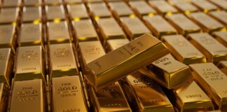 JPMorgan tweaks gold price target as Fed risks return