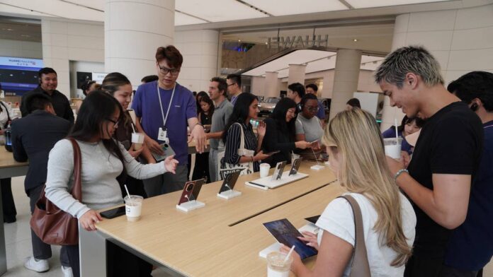 July 30 is <a href="https://www.thestreet.com/tag/tim-cook">Tim Cook</a>'s last <a href="https://www.thestreet.com/dictionary/e/earnings-call">earnings call</a> as Apple's CEO. He's been running the company since 2011, and when he gets off that call, John Ternus takes over. That alone makes this quarter worth paying attention to, beyond the usual revenue-and-margins conversation.Bank of America published its preview note ahead of the July 30 report and kept its buy rating and $380 price target. The bank expects Apple (<a href="https://www.thestreet.com/quote/AAPL">AAPL</a>) to beat <a href="https://www.thestreet.com/dictionary/w/wall-street">Wall Street</a>'s numbers for the quarter. But the more interesting part of the note isn't about June. It's about what comes next.<strong>Bank of America reiterates buy on Apple stock ahead of Q3 earnings</strong>Bank of America analyst Wamsi Mohan models fiscal third-quarter revenue of $109 billion and <a href="https://www.thestreet.com/dictionary/e/earnings-per-share-eps">earnings per share</a> of $1.89, both slightly above the Street consensus of $108 billion and $1.87, <a href="https://www.thestreet.com/investing/stocks/bank-of-america-resets-apple-stock-price-target-on-ai-update">as TheStreet reported</a>. That would put revenue growth at 16% year over year, near the top of Apple's own guidance range of 14% to 17%.iPhone demand is driving most of it. The bank expects iPhone revenue to climb more than 20% year over year in the quarter. Services continues growing in the double digits. Gross margin is modeled at 48.2%, right in the middle of Apple's guidance range of 47.5% to 48.5%.The June quarter looks fine. It's the September quarter that Bank of America is already flagging as the one to watch.<strong>Apple gross margins face near-term pressure from component costs</strong>Memory chip prices are still elevated across the tech industry, and Apple isn't immune. In the June quarter, the bank models product gross margins dropping roughly 190 basis points compared to the previous quarter. In the September quarter, that decline gets worse, another 280 basis points down, as higher component costs hit at the same time the company goes through its typical pre-launch slowdown before new iPhones ship.<strong>More Apple:</strong><a href="https://www.thestreet.com/technology/apple-sues-openai-ai-ip-theft-concerns-supports-alex-karp-warnings"><strong>Apple stock move vindicates Palantir CEO warning for AI industry</strong></a><a href="https://www.thestreet.com/investing/apples-iphone-cost-problem-reveals-ai-hidden-bill"><strong>Apple’s iPhone cost problem reveals AI’s hidden bill</strong></a><a href="https://www.thestreet.com/investing/apple-2027-new-ipad-pro-macbook-pro-sends-wall-street-warning"><strong>Apple’s 2027 hardware refresh sends Wall Street a warning</strong></a>The bank sees this as temporary. When the new iPhone lineup hits in the fall, including the foldable model coming at a higher price point, margins are expected to recover sharply in the December quarter. A potential $3 billion tariff recovery benefit could help, too. But the path through September is going to look ugly on paper, and Bank of America is calling it out directly so investors aren't caught off guard.Services margins are a different story. The bank models Services gross margins at 76.5% for the June quarter and holding steady around 76% through the rest of the year. One thing worth watching: App Store growth slowed sharply, coming in at 3.2% year over year in Q3, down from 9.8% in Q2, according to SensorTower data cited in BofA's note. The bank expects iCloud and licensing to offset that weakness. Over time, as Services becomes a larger share of Apple's overall revenue mix, the bank sees potential for company-wide gross margins to eventually reach 50%.<strong>Apple's staggered iPhone launch will shift seasonal revenue patterns</strong>This is probably the most important operational change Bank of America is flagging. Apple is not releasing all its new iPhones at the same time this year.The Pro, Pro Max, and foldable models are coming in September as expected. But the standard iPhone and the new iPhone Air are being pushed to March 2027. That's a meaningful departure from how Apple has historically launched its lineup, <a href="https://www.thestreet.com/investing/bank-of-america-predicts-a-major-pricing-shift-for-apple-stock">as TheStreet reported</a>.Here's why that matters for investors tracking the numbers. Historically, Apple's December quarter has been its biggest because the whole iPhone lineup ships in the fall and drives a surge in holiday sales. If half the lineup doesn't ship until March, some of that December quarter revenue moves into the March quarter instead. The September and December results could look weaker than investors are used to seeing, while early 2027 gets a boost it typically wouldn't.Bank of America is already reflecting this in its estimates. It models fourth-quarter revenue of $106 billion versus the Street consensus of $114 billion. That's an $8 billion gap, and the staggered iPhone launch is the main reason.
This is probably the most important operational change Bank of America is flaggingSheldon/Getty Images
<strong>Tim Cook's final earnings call and the Apple CEO transition</strong>The July 30 call is historic in a quiet way. Tim Cook has been Apple's CEO for 15 years. He took over from <a href="https://www.thestreet.com/personalities/steve-jobs-net-worth-how-rich-could-he-have-been">Steve Jobs</a> in 2011 and oversaw its growth into the world's most valuable company. On Sept. 1, he becomes executive chairman. John Ternus, who led Apple's hardware engineering, takes over as CEO, <a href="https://www.cnn.com/2026/04/30/tech/apple-earnings-john-ternus-new-ceo">according to CNN</a>.Ternus was on the Q2 earnings call briefly, saying there was "an incredible roadmap ahead." He'll lead his first full earnings call in October. What Cook says on July 30 about the transition, the foldable iPhone launch timing, and Apple's <a href="https://www.thestreet.com/tag/artificial-intelligence">AI</a> direction will be dissected closely because it's the last time investors get to ask him those questions in that context, <a href="https://www.foxbusiness.com/markets/apple-chief-tim-cook-says-right-time-step-down-ceo">according to Fox Business</a>.<strong>What Apple investors are watching on China, AI, and the Google deal</strong>The June quarter result isn't really the story this time. Bank of America's note makes that clear. The questions investors are lining up are bigger than whether Apple beats by a few cents.China is one of them. Domestic competition from Huawei and other Chinese smartphone makers has been intensifying, and Apple's <a href="https://www.thestreet.com/dictionary/m/market-share">market share</a> there has faced real pressure. Any commentary from Cook on demand trends in China will move the stock.The Google search deal is another. Apple earns billions every year from Google for making it the default search engine on Safari. That arrangement is under regulatory scrutiny, and the rise of AI assistants is starting to shift how people search. If that revenue stream is at risk, it affects Apple's Services growth story in a meaningful way.And then there's AI. Apple has 2.5 billion active devices and a partnership with Google to integrate Gemini into Siri. The capabilities are improving. But investors still don't have a clear answer on how Apple plans to actually make money from AI. Whether that drives upgrades, expands subscription revenue, or creates something entirely new is the question the company hasn't fully addressed.<strong><a href="https://www.thestreet.com/investing/stocks/hsbc-upgrades-apple-stock-price-target-ahead-of-earnings">Related: Top analyst resets Apple stock price target ahead of earnings</a></strong>