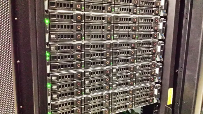 A record backlog is usually read as a promise. In Dell Technologies' case it is closer to a fixed-price contract written before the cost of the parts moved. Dell (NYSE: DELL) closed at <strong>$451.50</strong> on 25 August 2026, up 4.23% on the day and up roughly 245% from the $130.99 it fetched a year earlier. The company enters its 1 September earnings print carrying a <strong>$43 billion AI-optimised server backlog</strong>, and that backlog was priced when memory was cheaper. Our <strong>Dell stock prediction</strong> puts a bull case at <strong>$640</strong> and a bear case at <strong>$330</strong>, and the gap between them is not a disagreement about whether the AI revenue is real. It plainly is. The disagreement is about what a dollar of that revenue is worth once it reaches the operating line.
Here is the part the consensus coverage keeps missing. Backlog is an asset when input costs fall and a liability when they rise, because the selling price is struck at order time while the bill of materials is paid at build time. On 24 August, FinanceFeeds reported that <a href="https://financefeeds.com/nvidia-nvda-ai-server-price-hike-memory-costs/">Nvidia is raising AI server prices by more than 15% as memory costs soar</a>, with the increases applying to systems shipping in early 2027, including Grace Blackwell platforms. Dell is precisely the customer that absorbs that. A large slice of the $43 billion was booked before that repricing existed. If Dell converts backlog into revenue at yesterday's prices using tomorrow's components, the margin compression already visible in the filings is not a one-off supply-chain hiccup. It is the shape of the next several quarters.
Key facts
<strong>Share price:</strong> $451.50 at the close on 25 August 2026, +4.23% on the session; 52-week range $110.22 to $514 — stockanalysis.com, 25 August 2026
<strong>Q1 FY2027 revenue:</strong> a record $43.8 billion, up 88% year over year — <a href="https://www.sec.gov/Archives/edgar/data/1571996/000157199626000021/exhibit991earnings8kq1fy27.htm">Dell 8-K exhibit 99.1, 28 May 2026</a>
<strong>AI-optimised server revenue:</strong> $16.132 billion in Q1 FY2027, up 757% year over year — Dell 8-K, 28 May 2026
<strong>ISG operating margin:</strong> 10.5% in Q1 FY2027, down from 14.8% in Q4 FY2026 — computed from Dell 8-K segment tables
<strong>AI backlog:</strong> $43 billion entering FY2027, after booking more than $64 billion in AI orders during FY2026 — <a href="https://www.sec.gov/Archives/edgar/data/1571996/000157199626000003/exhibit991earnings8kq4fy26.htm">Dell 8-K exhibit 99.1, 26 February 2026</a>
<strong>FY2027 guidance:</strong> revenue $165–169 billion, non-GAAP diluted EPS $17.90 at the midpoint, AI-optimised server revenue of roughly $60 billion — Dell 8-K, 28 May 2026
<strong>Input cost shock:</strong> Nvidia raising AI server prices by more than 15% on systems shipping in early 2027 — Bloomberg, reported 24 August 2026
What is actually happening at Dell
Dell's Q1 FY2027, reported on 28 May 2026, was an extraordinary quarter by any conventional measure. Revenue of $43.842 billion was up 88%. GAAP diluted EPS of $5.24 rose 282%. Non-GAAP diluted EPS of $4.86 rose 214% and came in well above the roughly $2.94 the street had modelled. Infrastructure Solutions Group revenue reached $29.009 billion, up 181%, with AI-optimised servers contributing $16.132 billion of that, up 757% from $1.882 billion a year earlier.
The mechanism is straightforward. Dell integrates Nvidia accelerators into rack-scale systems, qualifies them, ships them, and services them. When hyperscalers and neoclouds want compute in volume and on a schedule, Dell's supply chain is one of a small number that can deliver it. That is a genuinely valuable capability and it has produced genuinely enormous revenue.
What it has not produced, so far, is a proportional increase in profit. Work through the segment tables across five quarters and ISG operating margin runs 9.7%, 8.9%, 12.1%, 14.8%, then 10.5%. The peak is Q4 FY2026. The most recent quarter gave back 4.3 percentage points of it. Over the same stretch, AI-optimised servers went from 18.2% of ISG revenue to 55.6%. The correlation is not subtle: as the AI mix rises, the segment margin falls.
Dell's own executives have been direct about the scale of the opportunity rather than the economics of it. "We booked $24.4 billion in AI orders and recognised $16.1 billion of AI server revenue," said Jeff Clarke, vice chairman and chief operating officer, in the Q1 FY2027 release. "We're increasing our AI server revenue expectations for FY27 to $60 billion, which only goes to show the AI opportunity shows no signs of slowing." Chief financial officer David Kennedy framed the top line the same way, pointing to "record revenue of $43.8 billion, record EPS, record Q1 cash flow of $4.1 billion" and a full-year outlook "raised to $167 billion at the midpoint, up nearly 50% year over year."
Both statements are true. Neither addresses what happens to the operating margin when the mix keeps shifting.
How the industry is responding
Dell's position is that the compression is transitory: one-time supply-chain costs and aggressive pricing on early Blackwell deals, with value engineering, scale, and a better enterprise mix expected to restore AI server profitability as the fiscal year progresses. That is a real argument. Early-generation hardware is usually the least profitable, and enterprise buyers pay more than hyperscalers for the same silicon.
The counter-argument has been gaining adherents. <a href="https://fortune.com/2026/06/30/dells-ai-boom-real-but-so-is-profit-margin-hit/">Fortune framed the question in June</a> as whether Dell is becoming a durable AI profit engine or "a much bigger but lower-margin role as the company that packages expensive Nvidia-based systems for the AI buildout." The market has already voted on that question once, repricing the stock by 7% in a single session on margin fear.
The supplier side is where this gets concrete. Nvidia's decision to raise system prices by more than 15% is a direct transfer of memory inflation onto integrators, and Dell cannot pass all of it forward on business it has already booked. FinanceFeeds has tracked the same cost wave through the memory complex itself, where <a href="https://financefeeds.com/western-digital-wdc-stock-prediction-900-bull-285-bear/">Western Digital's repricing</a> reflects how tight storage and memory supply has become. The squeeze on Dell is the mirror image of the windfall upstream.
It is worth being precise about who is exposed. Dell's Client Solutions Group — the PC business — posted a 8.0% operating margin in Q1 FY2027 on $14.609 billion of revenue, up 17%. That is a healthier margin than ISG delivered in the same quarter, which is a genuinely strange sentence to write about a company whose entire equity story is AI infrastructure. Storage, at $4.334 billion and up only 8%, remains the highest-quality revenue Dell has and the slowest-growing.
The valuation maths
At $451.50 against FY2027 non-GAAP EPS guidance of $17.90, Dell trades on roughly 25 times forward earnings. For a company guiding to 47% revenue growth, that is not an obviously stretched multiple, and it is the single strongest argument the bulls have. The stock is not priced like a bubble. It is priced like a fast-growing hardware company.
The two panels above are the whole debate. On the left, a stock that has quadrupled and now sits between our two scenarios. On the right, the reason the scenarios are so far apart.
Scenario
Target
Implied maths
What has to be true
<strong>Bull</strong>
$640
~30x FY2028 non-GAAP EPS of roughly $21.30
ISG margin recovers toward 13–14% as enterprise mix improves and early-Blackwell pricing rolls off; AI server revenue clears $60bn in FY27 and grows again in FY28; buybacks keep shrinking the share count
<strong>Base</strong>
~$500
28x the current $17.90 FY2027 guide
Roughly where the street sits; margin stabilises near 11–12% without fully recovering
<strong>Bear</strong>
$330
~18x FY2027 non-GAAP EPS of $17.90, or ~21x a missed $15.50
Mix shift proves structural, Nvidia's price increase lands on backlogged systems, and the market re-rates Dell toward integrator multiples
For context on where these sit against the sell side: 27 analysts tracked by S&P Global carry an average target near $502.78, with a low of $360 and a high of $700. Our bull case sits below the street's most optimistic number and our bear case sits below its most pessimistic one. That is deliberate. Sell-side bear cases typically model an earnings miss while holding the multiple roughly constant. The scenario that actually hurts is the one where both compress at once, and that combination is what a structural mix shift produces.
The bull case does not require heroics. It requires ISG margin to behave the way Dell says it will. Push the segment back to 13.5% on FY2028 ISG revenue in the region of $125 billion and the earnings power arrives without any change in the revenue story. The bear case does not require the AI trade to end either. It only requires 10.5% to be the new normal rather than a trough.
Regulation, export controls and the tail risk
The regulatory overhang on Dell is indirect but real, and it runs through the accelerators rather than the servers. Dell does not design the silicon that makes an AI-optimised server valuable; it integrates parts whose export is controlled. Any tightening of US restrictions on advanced accelerator shipments changes which customers Dell can sell a rack to, and any loosening changes the addressable market. That risk sits entirely outside management's control, which is precisely why it is underpriced in most models.
Customer concentration compounds it. Large AI infrastructure orders cluster among a small number of hyperscalers, sovereign programmes and neoclouds. A backlog is only as good as the counterparties behind it, and the financing conditions for that buyer class have been tightening — FinanceFeeds documented the mechanism when <a href="https://financefeeds.com/coreweave-fell-12-because-its-debt-got-expensive/">CoreWeave fell 12% because its debt got more expensive</a>. Neoclouds fund GPU purchases with debt. When that debt reprices, order books further down the chain get renegotiated, deferred, or quietly cancelled. Dell's $43 billion is reported as backlog, not as cash, and the distinction matters more in a tightening cycle than in a loosening one.
None of this is a prediction that the backlog evaporates. It is a statement that the risk is asymmetric and does not appear in the revenue line until after it has appeared in the customers' balance sheets.
What happens next
Dell reports Q2 FY2027 after the close on <strong>Tuesday 1 September 2026</strong>, with the conference call at 3:30 p.m. CDT. Guidance calls for revenue between $44.0 billion and $45.0 billion, a midpoint of $44.5 billion and up 49%, with non-GAAP diluted EPS of $4.80 at the midpoint. <a href="https://polymarket.com/event/dell-quarterly-earnings-nongaap-eps-09-01-2026-4pt9">Polymarket currently prices a beat at around 90%</a>, though on modest volume, so treat it as a sentiment reading rather than a hard probability.
Three things matter more than the headline number.
<strong>First, the ISG operating margin line.</strong> Not revenue, not EPS, not the AI-server total — the segment margin. Above 12% and Dell's transitory-cost argument is credible and the bull path opens. At or below 10.5% for a second consecutive quarter and the market has to decide whether it is holding a growth company or an integrator with a very large order book.
<strong>Second, any commentary on backlog pricing.</strong> If management is asked how the Nvidia increase interacts with already-booked systems and gives a vague answer, assume the worst. If they disclose price-adjustment clauses or pass-through mechanisms, a meaningful piece of the bear case disappears immediately.
<strong>Third, the FY2027 AI-server figure.</strong> Dell raised it to roughly $60 billion in May. Raising it again while margin falls would confirm that Dell is buying revenue share; holding it while margin recovers would be the more valuable outcome and, we suspect, the less likely one.
Our base expectation is that Dell beats on revenue and EPS on 1 September and that the stock's reaction is decided by the margin line rather than the beat. Investors comparing this setup with other AI-infrastructure names may find our <a href="https://financefeeds.com/nvidia-nvda-stock-prediction-340-bull-135-bear/">Nvidia stock prediction</a> and <a href="https://financefeeds.com/nebius-nbis-stock-prediction-390-bull-vs-130-bear/">Nebius stock prediction</a> useful for triangulating where value sits across the stack, since the margin that leaves Dell's income statement is largely arriving on someone else's.
Frequently asked questions
When does Dell report Q2 FY2027 earnings?
Dell Technologies reports second-quarter fiscal 2027 results after the close on Tuesday 1 September 2026, with a conference call at 3:30 p.m. CDT. Guidance calls for revenue of $44.0–45.0 billion and non-GAAP diluted EPS of $4.80 at the midpoint. The release and prepared remarks are published on Dell's investor relations site ahead of the call.
What is a realistic Dell stock prediction for the next 12 months?
Our bull case is $640, roughly 30 times estimated FY2028 non-GAAP EPS of about $21.30, and our bear case is $330, roughly 18 times the current FY2027 guide of $17.90. The street average sits near $502.78 with a range of $360 to $700. The outcome depends far more on segment margin than on revenue growth.
Why is Dell's operating margin falling while revenue grows?
Because the growth is concentrated in AI-optimised servers, which carry lower margins than storage or traditional servers. Infrastructure Solutions Group operating margin fell from 14.8% in Q4 FY2026 to 10.5% in Q1 FY2027 as AI's share of segment revenue rose from 45.9% to 55.6%. Dell attributes the compression to one-time supply-chain costs and early Blackwell pricing.
How does Nvidia's price increase affect Dell?
Nvidia has told large customers that prices for servers containing its AI chips will rise by more than 15% for systems shipping in early 2027, driven by memory costs. Dell integrates those systems, so the increase raises its input costs. The risk is concentrated in backlog booked at prior pricing, where Dell may be unable to pass the full increase to the customer.
Is Dell stock expensive at $451?
On the headline multiple, no. At roughly 25 times FY2027 non-GAAP guidance for a company guiding to 47% revenue growth, Dell is not priced aggressively relative to its growth rate. The question is whether the earnings base is durable, since a multiple that looks cheap against a peak-margin earnings estimate is not cheap at all.
What is Dell's AI backlog and should investors trust it?
Dell entered FY2027 with a record $43 billion AI-optimised server backlog after booking more than $64 billion in AI orders during FY2026. Backlog is a genuine indicator of demand, but it is not cash, it is priced at order date, and its quality depends on the financial health of the buyers — a live consideration as debt costs for AI infrastructure buyers rise.
<em>This article is editorial analysis and information, not investment advice. Bull and bear cases are FinanceFeeds estimates derived from company filings and are not Dell Technologies guidance. Figures were verified against primary sources as of 26 August 2026; markets move and readers should verify current prices before acting.</em>