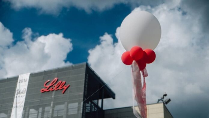 <strong>Eli Lilly</strong> (LLY) has spent the last two years as the company everyone points to when they talk about weight-loss drugs.
That reputation made it the <strong>most valuable pharmaceutical company</strong> in the world.
It also created a problem the company now seems eager to solve.
On <strong>August 31</strong>, Lilly agreed to buy <strong>Merida Biosciences</strong> for up to <strong>$2.88 billion in cash</strong>.
This deal expands Lilly’s work into autoimmune diseases, which is a different field from the weight-loss and diabetes shots that made the company famous.
For anyone holding LLY shares or thinking about buying in, this deal tells you something useful about how its management plans to keep the company growing after the obesity boom cools.
Why Eli Lilly is paying $2.88 billion to move past obesity
Lilly makes Mounjaro for diabetes and Zepbound for weight loss. Together, those two drugs drive most of its sales and nearly all of its stock story.
That concentration is the risk. When one drug class carries a company this large, any slowdown in demand or pricing can hit the shares hard.
Lilly’s management knows this, so it has been spending its obesity cash to buy growth in other areas.
The Merida purchase is Lilly’s <strong>13th acquisition of 2026</strong>, the most of any large drugmaker this year, according to <a href="https://www.biopharmadive.com/news/lilly-merida-acquire-deal-immune-drugs-graves-disease/829152/">BioPharma Dive</a>.
It follows two other immunology deals, a <strong>$1.2 billion buyout of Ventyx Biosciences</strong> and a purchase of <strong>Orna Therapeutics worth up to $2.4 billion</strong>.
The pattern is clear. Lilly is turning a single-drug success into a broader pipeline, and immunology is one of its main targets.
Eli Lilly is using its obesity-drug profits to expand into autoimmune disease through its purchase of Merida Biosciences.<a href="https://www.gettyimages.com/detail/542007658">lcodacci / Getty Images</a>
What Merida Biosciences actually does
Merida is a small, privately held company that began operating publicly last year with <strong>$121 million in funding</strong>, <a href="https://www.fiercebiotech.com/biotech/eli-lilly-inks-29b-merida-buyout-autoimmune-drugs-against-rogue-antibodies">Fierce Biotech</a> reported.
What sets Merida apart is how narrowly its drugs are built to work.
Most autoimmune treatments suppress the whole immune system, which can leave patients open to infection.
Merida’s drugs are designed to find and remove only the specific antibodies that cause the body to attack itself, while leaving healthy immune function alone. Those rogue antibodies are called autoantibodies.
<strong>More Healthcare Stocks:</strong>
<a href="https://www.thestreet.com/investing/stocks/bank-of-america-eli-lilly-stock-international-obesity-glp1-lly"><strong>BofA sees Eli Lilly’s overseas obesity sales topping the U.S.</strong></a>
<a href="https://www.thestreet.com/investing/stocks/eli-lilly-foundayo-pill-uk-approval-weight-loss-glp1-lly"><strong>Eli Lilly’s Foundayo pill wins first European approval</strong></a>
<a href="https://www.thestreet.com/investing/stocks/nvo-novo-nordisk-doustdar-resets-expectations-wegovy-pill-growth-after-sales-miss"><strong>Novo Nordisk CEO resets expectations for Wegovy’s growth</strong></a>
The lead drug, <strong>MER511</strong>, is in early testing for Graves’ disease and thyroid eye disease.
Graves’ disease affects <strong>about 1% of the U.S. population</strong> and forces the thyroid to overproduce hormones, according to <a href="https://www.bioprocessintl.com/business/lilly-to-acquire-biotech-firm-merida-in-2-87bn-deal">BioProcess International</a>.
A second candidate, <strong>MER769</strong>, targets food allergies, asthma, and related conditions.
How the deal protects Lilly if the science fails
The $2.88 billion figure grabs headlines, but Lilly is not writing that check all at once.
The agreement includes an <strong>upfront cash payment</strong> plus <strong>milestone payments</strong> tied to how far Merida’s drugs progress, <a href="https://www.reuters.com/legal/litigation/eli-lilly-buy-merida-biosciences-288-billion-deal-2026-08-31/">Reuters</a> reported. Lilly did not disclose the exact split.
That structure matters for shareholders. If MER511 hits a safety or efficacy wall in later trials, Lilly stops paying and its total cost stays well below the full price.
<strong><a href="https://www.thestreet.com/investing/stocks/bmy-bristol-myers-stock-earnings-morgan-stanley">Related: Morgan Stanley uncovers major Bristol Myers stock signals</a></strong>
BMO Capital Markets called the purchase a sensible use of capital that fits Lilly’s earlier moves and adds variety to its immunology pipeline, according to <a href="https://www.biospace.com/deals/deal-hungry-lilly-strikes-up-to-2-9b-immuno-play-for-merida">BioSpace</a>.
<a href="http://tipranks.com/experts/analysts/david-risinger">David Risinger</a>, an analyst at Leerink Partners, read it as more proof that management wants to diversify beyond obesity.
Why this deal will not move LLY earnings anytime soon
Here is the part investors should sit with before getting excited.
MER511 is in Phase 1, the earliest stage of human testing. Drugs at this stage usually take years to reach the market, if they get there at all.
You should treat this as a long-term pipeline bet, not a reason to expect higher earnings over the next 12 to 24 months.
The deal is expected to close in the fourth quarter of 2026, <a href="https://www.reuters.com/legal/litigation/eli-lilly-buy-merida-biosciences-288-billion-deal-2026-08-31/">Reuters</a> confirmed.
Real revenue, if it comes, sits several years past that.
Lilly’s current results carry the stock for now.
In the second quarter, the company beat earnings expectations by <strong>27.27%</strong> and beat revenue expectations by <strong>11.06%</strong>, with quarterly revenue of <strong>$22.97 billion</strong>, <strong>up 47.67%</strong> from a year earlier.
The risks Lilly investors should keep watching
A deal this early carries real risk. Here are a few things that could go wrong:
Risks tied to the Merida bet
<strong>A steep price for unproven science</strong>. Merida raised just $121 million before this sale, so Lilly is paying a large premium for a drug that has cleared only early testing.
<strong>Strong competition already in place</strong>. If MER511 reaches the market, it will meet Amgen’s Tepezza and Viridian Therapeutics’ Lumvoa, both already established in thyroid eye disease, according to <a href="https://www.cnbc.com/2026/08/31/eli-lilly-to-buy-merida-biosciences.html">CNBC</a>.
<strong>More early-stage bets raise the odds of a costly failure</strong>. With 13 acquisitions this year, Lilly now runs a large and expensive early-stage pipeline, and clinical failures across that many programs add up.
The stock also leaves little room for error.
LLY trades at a <strong>price-to-earnings ratio of 39.32</strong>, well above most large drugmakers, which means a lot of future growth is already built into the price.
The bottom line for LLY investors
Lilly <strong>closed at $1,170.98</strong> on <strong>September 2</strong>, <strong>up 0.95%</strong> on the day and <strong>8.39%</strong> for the year.
It sits below its <strong>52-week high of $1,292.65</strong>.
The Merida deal will not impact those numbers this quarter or next. What it changes is the shape of the company you are buying.
Two years ago, Lilly was an obesity story. Today it is spending that obesity money to become something wider, with real positions in immunology, oncology, and other fields.
For a long-term investor, that diversification lowers the danger of leaning on one drug class forever.
For anyone chasing near-term gains, this deal offers little, and the high valuation means any stumble in the core business can still sting.
A good approach is to judge LLY on its Mounjaro and Zepbound sales for now, and to view deals like Merida as slow-building options that may pay off years down the road.
Size any position to your own risk comfort, because even the market’s strongest names fall hard when expectations run this high.
<strong><a href="https://www.thestreet.com/investing/stocks/bank-of-america-gilead-gild-stock-hiv-yeztugo-persistence">Related: Key HIV stat over 70% leaves BofA siding with Gilead</a></strong>