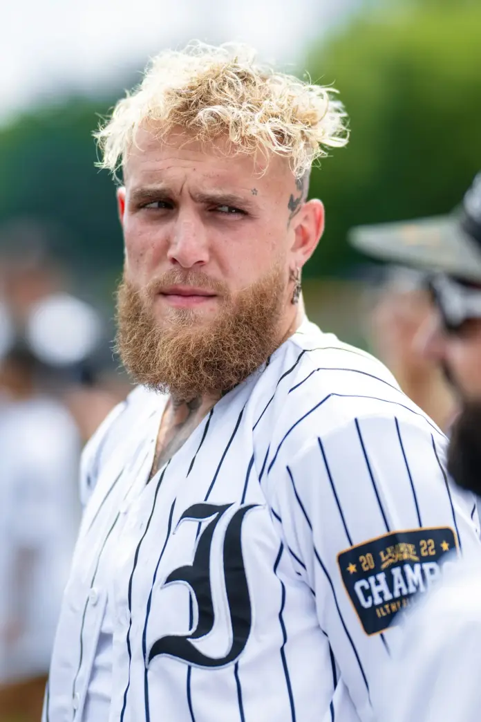 Start with the number that settles the rumour: zero. That is how many registration statements exist for W, Jake Paul's men's personal-care brand, in the SEC's EDGAR full-text database as of August 2, 2026 — we searched it directly rather than relying on secondhand chatter. The "Jake Paul W IPO" query circulating this summer describes a listing that has not been filed, scheduled, or officially teased. The 13 S-1 filings that do mention Jake Paul belong to third parties — Triller's long-running listing attempts, LiveXLive-era media deals — not to any company he controls. And a 30-day sweep of Reddit, X and social platforms turns up exactly zero credible IPO chatter around W: the Jake Paul conversation this month is entirely about his Most Valuable Promotions merging with the Professional Fighters League.
Here is what makes the question worth answering anyway — and what no gossip-tier coverage runs the math on. W last raised at a reported $150 million valuation and was tracking toward $50 million in first-year retail sales through a Walmart exclusive. The celebrity personal-care benchmark has since been reset violently upward: Hailey Bieber's Rhode sold to e.l.f. Beauty in 2025 in a deal worth up to $1 billion, on roughly $212 million of annual sales. Apply Rhode's revenue multiple to W's reported trajectory and you get the bull case the rumour mill is unknowingly pricing; look at what happened to Jessica Alba's Honest Company after its $1.4 billion IPO — it lost most of its value within two years of listing — and you get the bear case. The gap between $150 million and $1 billion is the entire story, and it runs straight through whether W's sales survived past the launch-year sugar high.
<strong>Key Facts</strong>
SEC registration statements filed for a W IPO: <strong>0</strong> — EDGAR full-text search, August 2, 2026; the 13 S-1s mentioning Jake Paul are third-party filings (Triller Corp., LiveXLive-era entities)
W's last reported valuation: <strong>$150 million</strong>, after a <strong>$14 million</strong> raise — <a href="https://www.hollywoodreporter.com/business/business-news/jake-paul-w-products-walmart-mens-bodycare-line-1235954873/">The Hollywood Reporter</a>
First-year sales trajectory: on track to surpass <strong>$50 million</strong> via a Walmart exclusive — <a href="https://fortune.com/2024/06/12/jake-paul-w-personal-care-deodorant-influencer-boxer-ceo/">Fortune</a>, June 2024
The benchmark: Rhode sold to e.l.f. Beauty for up to <strong>$1 billion</strong> (2025); Honest Company listed at <strong>~$1.4 billion</strong> (2021) and lost most of that value within two years
The wider Paul portfolio: Betr last valued at <strong>$375 million</strong> — <a href="https://www.bloomberg.com/news/articles/2024-03-06/jake-paul-s-betr-sportsbook-startup-raises-funds-at-375-million-valuation">Bloomberg</a>; Anti Fund runs <strong>$65 million+</strong> in AUM; MVP merged with the PFL in July 2026
Paul's own IPO activity in 2026: buying, not selling — <strong>70,000 SpaceX shares at the $135 IPO price</strong>, by his own account
What W actually is — and why the rumour found an audience
W launched in June 2024 as a Gen Z men's body-care line — body wash, spray, antiperspirant — built for a Walmart-exclusive retail footprint of roughly 4,000 stores, with Paul as co-founder and the brand's entire marketing engine. The origin story he tells is deliberately unglamorous: the idea came from a rare trip to a CVS aisle he found boring, per <a href="https://fortune.com/2024/06/12/jake-paul-w-personal-care-deodorant-influencer-boxer-ceo/">Fortune's profile</a>. "This is my baby," Paul said of the brand at launch, per <a href="https://www.foxbusiness.com/sports/jake-paul-launches-mens-personal-care-line-walmart-this-my-baby">Fox Business</a> — and the early numbers backed the enthusiasm: a $14 million raise, a reported $150 million valuation, and a first-year sales pace pointed at $50 million.
Two years on, the public record on W is thinner than the launch coverage suggested it would stay. The brand still trades on its Walmart placement and Paul's own channels; no follow-on funding round, no revenue update and no expansion announcement has been independently reported since the launch-year figures. In consumer packaged goods, silence is not neutral — brands renewing shelf space at scale usually say so — but it is not damning either, and privately held CPG companies routinely go quiet between capital events. What the silence does do is make every circulating valuation number a 2024 artefact applied to a 2026 question.
The IPO rumour has a logic to it, which is why it keeps resurfacing without a filing behind it. Celebrity consumer brands are in their exit era: Rhode's billion-dollar sale reset every founder's expectations, Skims and Fenty carry multi-billion private marks, and the IPO window for consumer names reopened through 2026. A 29-year-old founder with a 70-million-follower distribution machine and a brand doing eight figures at Walmart is, structurally, exactly the kind of asset bankers pitch. What is missing is any evidence the pitch has been accepted: no S-1, no confidential-filing reports from Bloomberg or Reuters, no banker mandates, and — the tell that costs nothing to check — no positioning from Paul himself, a man not historically shy about announcing things.
The empire context: everything around W is consolidating, not listing
Read Paul's 2026 corporate moves in sequence and they point away from a near-term W listing. The headline transaction of his summer was Most Valuable Promotions merging with the Professional Fighters League in July — a consolidation that makes his combat-sports vehicle the UFC's most credible challenger, per <a href="https://sports.yahoo.com/mma/article/jake-paul-just-took-over-the-ufcs-biggest-competitor-heres-what-it-all-means-mvp-pfl-merger-150904254.html">Yahoo Sports</a>. Betr, his micro-betting operator last valued at $375 million, remains private with, in the words of pre-IPO marketplace Forge, no confirmed IPO announcement — and its sector context is turbulent enough that staying private looks tactical: prediction markets are eating sportsbook volume, with <a href="https://financefeeds.com/kalshi-and-polymarket-logged-54-billion-in-sports-volume-during-world-cup/">Kalshi and Polymarket logging $54 billion in sports volume during the World Cup</a>.
Venture investor Molly O'Shea's much-shared summary of the portfolio captures the scale the rumour feeds on: "Jake Paul has built quite the business empire on top of a 70M+ social media following & a $170M+ boxing career," she wrote, itemising W at $150 million, Betr at $375 million and Anti Fund at $65 million-plus in assets under management. Notably, Paul's only confirmed brush with the 2026 IPO market has been as a buyer: he disclosed loading up on 70,000 SpaceX shares at the $135 IPO price — the listing our desk covered in its <a href="https://financefeeds.com/spacex-stock-bull-bear-case/">SpaceX bull-versus-bear breakdown</a>. Founders preparing their own listings tend to be in quiet periods, not posting allocation flexes. Every observable signal says the empire's 2026 project is consolidation and positioning, with any W liquidity event a downstream option, not a live process.
The IPO math: $1bn bull case, $150m reality, and what decides it
Since the rumour will not die, price it properly. The chart below places W's last mark against the two celebrity benchmarks that define the range.
<strong>The bull case — roughly $1 billion.</strong> Rhode sold to e.l.f. for up to $1 billion on about $212 million in annual net sales — call it 4.7x revenue for a three-year-old celebrity brand with distribution heat. If W sustained and compounded its $50 million first-year pace to, say, $150–200 million of sales by 2027 while holding Walmart velocity and adding channels, Rhode's multiple maps W into the $700 million–$1 billion zone. That is the arithmetic behind every "Jake Paul billionaire" headline — and it is genuinely available <em>if</em> the revenue line did what launch-year projections promised.
<strong>The bear case — the Honest Company path.</strong> Jessica Alba's Honest listed in May 2021 at roughly $1.4 billion and spent the next two years losing most of that value as growth stalled and marketing costs ate margins. Celebrity distribution gets a brand its first $50 million faster than anything in consumer; it does nothing to defend year-three shelf space, and public markets price the difference ruthlessly. A W that plateaued near launch-year revenue would struggle to defend even its private $150 million mark in a listing — which may be the simplest explanation for why no S-1 exists.
<strong>The category comp the bulls should actually cite.</strong> The cleaner precedent than either Rhode or Honest sits in W's own aisle: Dr. Squatch, the digitally native men's soap brand, was acquired by Unilever in June 2025 in a deal reported around $1.5 billion — proof that men's personal care specifically, not just celebrity beauty, commands strategic premiums when the revenue is real and repeatable. The differences are instructive, though. Dr. Squatch spent a decade building a subscription-heavy direct-to-consumer engine before layering in retail; W inverted the sequence, launching straight into 4,000 Walmart doors with a founder's audience as the customer-acquisition engine. The first model produces the retention data an acquirer or IPO investor can underwrite; the second produces spectacular launch numbers whose durability is unknowable from outside. That asymmetry — not scepticism about Paul's marketing reach, which is empirically elite — is what separates a $150 million mark from a ten-figure exit.
Scenario
Anchor
Implied W value
What has to be true
<strong>Bull</strong>
Rhode: ~$1bn on ~$212m sales (~4.7x)
$700m–$1bn
Sales compound well past $150m; Walmart velocity holds; channel expansion works
<strong>Base</strong>
Last private round
~$150m
Brand holds launch-year scale; no new capital event
<strong>Bear</strong>
Honest Co. post-IPO trajectory
Below $150m
Growth stalled after year one; marketing spend outruns margin
<em>Sources: e.l.f. Beauty acquisition reporting (2025); The Hollywood Reporter (W raise); Honest Co. IPO record. Scenario analysis by FinanceFeeds — W has made no filing and published no audited financials.</em>
The structural problem: nobody outside can check the number
The regulatory dimension is what separates this from a normal pre-IPO guessing game. W is private and consumer-packaged-goods private companies disclose nothing: no audited revenue, no margin, no churn on those Walmart reorders. Until a registration statement exists, every valuation number in circulation — including the $150 million — is a funding-round mark, not a market price. That is exactly the information vacuum in which celebrity-brand rumours compound, and regulators have started treating the celebrity-finance boundary as a live risk area in adjacent markets — <a href="https://financefeeds.com/asic-warns-ai-deepfakes-and-fake-celebrity-endorsements-are-fueling-pump-and-dump-stock-scams/">ASIC has warned that fake celebrity endorsements are fuelling investment scams</a>, and the retail appetite for famous-name listings is strong enough that platforms now manufacture access: <a href="https://financefeeds.com/kraken-opens-jersey-mikes-ipo-access-to-us-and-global-investors/">Kraken opened tokenised IPO access to Jersey Mike's for global retail investors</a> this summer. An eventual W listing would meet enormous retail demand precisely because of dynamics like these — which is also why the absence of a filing deserves stating as bluntly as the rumour states its premise. For a case study in how celebrity finance narratives outrun the underlying record, our <a href="https://financefeeds.com/dave-portnoy-will-hold-bitcoin-down-to-zero-but-regrets-buying-at-100000/">Dave Portnoy bitcoin saga coverage</a> is instructive.
What happens next: three calls
First: no W S-1 in 2026. The MVP–PFL integration is consuming the empire's operational bandwidth, the consumer-IPO window does not need to be rushed, and nothing in Paul's behaviour suggests a quiet period. EDGAR is the tripwire — a Form S-1 or a confidential-filing leak to Bloomberg or Reuters is the only event that changes this analysis.
Second: the more plausible W liquidity event is a strategic sale, not a listing. Rhode's exit taught every beauty conglomerate that paying up for celebrity distribution works when the founder stays attached; e.l.f., Unilever and L'Oréal all now have the playbook. A sale prints one number once — far friendlier to a brand whose year-two revenue nobody outside has seen.
Third: if any Paul entity reaches public markets first, watch Betr rather than W — not because a filing exists (it does not), but because the sportsbook-versus-prediction-market convergence is forcing capital decisions across that sector on a clock that body wash does not have. Either way, the number to remember from this summer's rumour cycle is the one at the top: zero filings, checked at the source.
FAQ
Is Jake Paul's W brand going public?
No — not on any verifiable record. As of August 2, 2026, the SEC's EDGAR database contains zero registration statements for W, and no confirmed banker mandate or confidential filing has been reported by any major outlet. The "W IPO" phrase circulating on social media describes a rumour, not a process.
What is W by Jake Paul worth?
The last reported number is a $150 million valuation, set around a $14 million raise reported by The Hollywood Reporter in 2024, when the Walmart-exclusive brand was tracking toward $50 million in first-year sales. No newer mark has been disclosed, and as a private company W publishes no audited financials.
What would a W IPO be worth in the bull case?
Using Rhode as the benchmark — Hailey Bieber's brand sold to e.l.f. Beauty for up to $1 billion on roughly $212 million of annual sales — W would need to compound well beyond its $50 million launch-year pace to justify a $700 million to $1 billion outcome. On its last reported numbers, it is a $150 million company.
Why do people think Jake Paul is taking a company public?
A mix of real events and extrapolation: his MVP promotion merged with the PFL in July 2026, he publicly disclosed buying 70,000 SpaceX shares at the $135 IPO price, and celebrity consumer brands are exiting at record prices. None of those events involves a W filing — they just make one imaginable.
Could Betr IPO before W?
Betr — Paul's micro-betting company, last valued at $375 million per Bloomberg — is also private with no confirmed IPO plans, per pre-IPO marketplace Forge. Its sector is under active repricing as prediction markets absorb sports-betting volume, which cuts both ways: pressure to consolidate, and reason to wait out the turbulence.
How can I verify IPO rumours myself?
Search the SEC's EDGAR full-text system for the company or founder name and filter for S-1 and F-1 forms — public listings cannot happen without a registration statement (confidential filings surface via major-outlet reporting). If EDGAR shows nothing and no tier-one outlet reports a mandate, the rumour has no documentary basis.