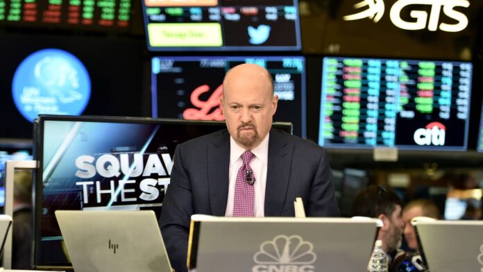 Last week, Jim Cramer told tech investors something most of them did not want to hear.If they were still holding a portfolio stuffed with <a href="https://www.thestreet.com/tag/artificial-intelligence">AI</a> and chip stocks, he said, they were about to get hurt, and hurt badly.His exact word was "slaughtered."That kind of language grabs attention, but the reasoning behind it deserves a closer look, because it points to a shift that could touch almost anyone who owns an <a href="https://www.thestreet.com/dictionary/i/index-fund">index fund</a>.What Jim Cramer actually told tech investors to doCramer delivered the warning on his July 21 appearance on CNBC's "Squawk on the Street." He said that holding too much tech during sharp market swings could lead to <strong>large losses</strong> before investors realize what happened. His phrasing left little room for doubt: "If you own too much tech, you're going to be slaughtered, and you won't even know what hit you," <a href="https://finance.biggo.com/news/d4127193-f078-4415-a418-47992f5e377b">BigGo </a><a href="https://finance.biggo.com/news/d4127193-f078-4415-a418-47992f5e377b">Finance</a> reported.The message was not a call to short the sector or predict a crash. It was about position sizing. Cramer wants investors who rode the AI trade to fresh highs, and never sold a share, to take some profits off the table, <a href="https://finance.yahoo.com/markets/stocks/articles/own-too-much-tech-going-102212540.html">Yahoo Finance</a> noted.The fix he suggested is simple: move some of that money into sectors that haven't risen as much.
Jim Cramer urged investors to trim tech before a heavy week of earnings.<a href="https://www.gettyimages.com/detail/929341828">Steven Ferdman / Getty Images</a>
Why Cramer thinks the AI trade has become dangerousThe core of Cramer's argument is <strong><a href="https://www.thestreet.com/dictionary/v/volatility">volatility</a></strong>.According to <a href="https://247wallst.com/investing/2026/07/21/jim-cramer-says-stop-betting-on-volatile-tech-stocks-and-buy-these-boring-sectors-instead/#:~:text=Cramer%20is%20fleeing%20tech%20as%20the%20VIX%20jumps%2025%25%20in%20a%20week%20and%20chip%20volatility%20hits%20a%2030%2Dyear%20high%20versus%20the%20broader%20market">24/7 Wall St</a>, he said chip volatility had reached a <strong>30-year high</strong> relative to the broader market, a claim that frames how violently these stocks now swing day to day.The fear gauge backs up the level of restlessness. The <strong>VIX</strong> had <strong>jumped 25% in a week</strong>, sitting <strong>near 18.77</strong>.For readers who have not tracked it, the VIX measures how much price movement traders expect in the <a href="https://www.thestreet.com/dictionary/s/s-p-500">S&P 500</a>. A sharp rise means the market is bracing for bigger swings.Cramer's second concern is that <strong>heavy AI spending</strong> has stopped guaranteeing gains.His example was <strong>Microsoft</strong> (<a href="https://www.thestreet.com/quote/MSFT">MSFT</a>). The stock <strong>fell 20%</strong> over the past year even while running a <strong>$37 billion AI revenue stream</strong>, according to <a href="https://247wallst.com/investing/2026/07/21/jim-cramer-says-stop-betting-on-volatile-tech-stocks-and-buy-these-boring-sectors-instead/#:~:text=Microsoft%20fell%2020%25%20over%20the%20past%20year%20despite%20a%20%2437%20billion%20AI%20run%20rate%2C%20while%20Salesforce%20dropped%2034%25%20year%20to%20date%20with%20Cramer%20holding%20no%20conviction%20below%20%24160">24/7 Wall St</a>.That's a sign that pouring money into AI no longer lifts a share price on its own.The hidden tech exposure sitting in your index fundHere is the part that reaches ordinary investors who never bought a single chip stock on purpose.<strong>Standard index funds</strong> are now heavily weighted toward a handful of tech giants.If you own an <strong>S&P 500 fund</strong>, a large slice of your money sits in the same names Cramer is warning about, whether you chose them or not.<strong><a href="https://www.thestreet.com/investing/stocks/hona-honeywell-aerospace-stock-jim-cramer-says-its-time-to-buy-alongside-boeing-and-ge-aerospace">Related: Jim Cramer says it’s time to buy another aerospace stock before it takes off</a></strong>That concentration works two ways. It boosted returns over the past two years. It also means a bigger drop if the leaders stumble together.The timing increased the worry. Cramer's warning landed just as <strong>Intel</strong> (<a href="https://www.thestreet.com/quote/INTC">INTC</a>), <strong>Tesla</strong> (<a href="https://www.thestreet.com/quote/TSLA">TSLA</a>), and <strong>Alphabet</strong> (GOOG) prepared to report earnings, with Intel due after the close on <strong>July 23</strong>, <a href="https://www.benzinga.com/markets/tech/26/07/60569367/jim-cramer-tech-stocks-nvidia-intel-other-sectors">Benzinga</a> reported. One weak report from a giant can drag the whole index down with it.The 'boring' sectors Cramer wants you to buy insteadCramer's alternative is not exciting, and that is the point.He pointed to <strong>financials and healthcare</strong>, where valuations look cleaner and earnings are already showing up in bank results, <a href="https://finance.yahoo.com/markets/stocks/articles/own-too-much-tech-going-102212540.html">Yahoo Finance</a> reported.He put real names behind the idea. Cramer recommended looking at <strong>Goldman Sachs</strong> (<a href="https://www.thestreet.com/quote/GS">GS</a>), <strong>Wells Fargo</strong> (<a href="https://www.thestreet.com/quote/WFC">WFC</a>), <strong>FedEx</strong> (<a href="https://www.thestreet.com/quote/FDX">FDX</a>), <strong>Honeywell</strong> (<a href="https://www.thestreet.com/quote/HON">HON</a>), and <strong>Boeing</strong> (<a href="https://www.thestreet.com/quote/BA">BA</a>), and noted his own club portfolio owns all five. <strong>More AI and Tech Stocks:</strong><a href="https://www.thestreet.com/investing/stocks/nvidias-ceo-doubles-down-on-ai-stock-market-verdict"><strong>Nvidia CEO doubles down on AI and stock market verdict</strong></a><a href="https://www.thestreet.com/technology/intel-amd-china-server-cpu-contracts"><strong>Intel and AMD just got leverage they haven’t had in years</strong></a><a href="https://www.thestreet.com/technology/openai-hugging-face-cyber-security-alarming"><strong>OpenAI just disclosed something genuinely alarming</strong></a>The bank numbers gave him cover. <strong>JPMorgan</strong> posted second-quarter earnings of <strong>$7.70 per share</strong> against $5.80 expected, with <strong>equity markets revenue up 86%</strong> compared to last year, <a href="https://247wallst.com/investing/2026/07/21/jim-cramer-says-stop-betting-on-volatile-tech-stocks-and-buy-these-boring-sectors-instead/">24/7 Wall St</a> reported. <strong>Trucking</strong> made his list too. <strong>J.B. Hunt</strong> (<a href="https://www.thestreet.com/quote/JBHT">JBHT</a>) is <strong>up 97%</strong> over the past year and beat estimates again, reinforcing the case for steadier cash-flow businesses.What has to happen for Cramer's call to look rightCramer has been early and wrong before, and he admits his own track record is mixed.His warning even revived the "Inverse Cramer" joke, where retail traders bet against his public calls.<strong>Last week</strong> gave his thesis a partial test, and the result was split. Alphabet <strong>fell about 7%</strong> after it raised its 2026 capital spending forecast, and Tesla dropped sharply on a second-quarter miss. Both outcomes align with his fear of crowded tech names. Intel cut the other way, <strong>rallying 9%</strong> on its strongest revenue growth in nearly <strong>15 years</strong>.The bigger test arrives <strong>this week</strong>. Microsoft and Meta report after the close on Wednesday, July 29, followed by Apple and Amazon on Thursday, July 30, according to TipRanks. The <a href="https://www.thestreet.com/dictionary/f/federal-reserve">Federal Reserve</a> also announces its rate decision on Wednesday.A few things would confirm Cramer's thesis:<strong>Microsoft or Meta disappoint</strong> on AI spending or cloud growth, and their shares drag the index lower.<strong>Banks and industrials</strong> keep posting the kind of beats JPMorgan just delivered.<strong>Volatility stays elevated</strong>, punishing investors who never trimmed.The reverse is just as possible. If this week's mega-cap reports come in strong, Cramer's move out of the sector could look premature.What investors can take from thisYou do not need to dump your tech holdings to act on the idea behind the warning.The practical step is to check how concentrated you already are, and this week is a useful time to look.Four of the largest companies in the market report within 48 hours, and Microsoft alone entered the week down roughly 18% for the year, according to <a href="https://www.asktraders.com/analysis/big-tech-earnings-week-microsoft-meta-apple-and-amazon-set-to-report/">AskTraders</a>. A weak print from any one of them can move an index fund that most people treat as diversified.If most of your gains this year came from a few AI names or from a fund that leans heavily on them, you are carrying more risk than your statement suggests.Trimming a portion and spreading it across steadier sectors is the kind of profit-taking Cramer is describing, not an all-or-nothing bet.Whether banks and industrials outrun chipmakers from here is unknown.What is clear is that the AI leaders now move sharply enough that owning too many of them, without a plan to rebalance, leaves an investor exposed to a drop they may not see coming.<strong><a href="https://www.thestreet.com/investing/stocks/jim-cramer-sends-a-strong-signal-to-nvidia-stock-investors-bullish-buy">Related: Jim Cramer sends strong signal to Nvidia stock investors amid rumors</a></strong>