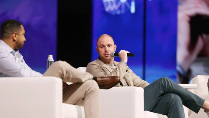 <strong>Riot Platforms (RIOT)</strong> has built its company for years around one exceedingly volatile asset: Bitcoin.Artificial intelligence may be offering it a completely unique future.Riot has signed a deal with Anthropic, the company behind Claude, to offer 191 megawatts of data-center capacity at its Rockdale, Texas, site, <a href="https://www.barrons.com/articles/anthropic-riot-platforms-deal-ai-bitcoin-f59f7a15">Barron’s</a> reported, in a deal worth about $9.1 billion for 20 years.There's a major caveat, however. Riot is not getting $9.1 billion up front, <a href="https://www.bloomberg.com/news/articles/2026-08-11/anthropic-strikes-9-billion-deal-with-cloud-computing-firm-riot">Bloomberg</a> noted. That sum is estimated revenue over 20 years. The overall deal's worth may reach approximately $16.1 billion with two possible five-year extensions.Riot entered the announcement with a market worth of about $7.3 billion, according to <a href="https://markets.businessinsider.com/news/stocks/riot-platforms-reports-second-quarter-2026-financial-results-and-strategic-highlights-1036437860">Business Insider</a>, suggesting the headline value of the original deal exceeds the company's pre-deal equity value. Riot made a total revenue of $647.4 million in 2025.Shares rose after the announcement as investors reevaluated what Riot’s infrastructure was really worth.But the main story isn't that Riot discovered a major new customer. It’s that the infrastructure built for Bitcoin mining, land, power hookups, and massive computing facilities has suddenly become appealing to an <a href="https://www.thestreet.com/tag/artificial-intelligence">AI</a> sector that’s desperate for electricity.The buildout may have been Bitcoin-funded.I suspect AI will eventually determine what is valuable.Riot Platforms is turning Bitcoin infrastructure into AI infrastructureThe Anthropic deal is for 191 megawatts of computing capacity at Riot’s location in Rockdale.That's important, since electricity is becoming one of the main bottlenecks to artificial intelligence growth.AI companies can buy those advanced chips, but they need a place to run. You need land, you need transmission capacity, you need cooling, you need networking, and you need tremendous amounts of reliable power to do hyperscale computing.Riot already has a lot of the hard part. Its Rockdale facility has about 700 megawatts of developed capacity spread across 200 acres or so, while its Corsicana, Texas, location has access to about 1 gigawatt. Riot says it has almost 2 gigawatts of completely certified power in its portfolio.These assets were worth something at first, because Bitcoin mining requires a lot of electricity. Now they intersect with what the AI businesses need.This might be a significant shift in Riot’s business model.Bitcoin mining revenue is a function of token values, difficulty of mining, and energy prices. Long-term data-center contracts can offer a considerably more reliable revenue source.<strong><a href="https://www.thestreet.com/retail/toy-mania-gears-up-during-holiday-shopping-season">Related: Toy mania gears up during holiday shopping season</a></strong>But the possibility isn't as simple as integrating AI computers into an old mining operation.High-performance AI data centers demand considerable additional infrastructure, including improved cooling, networking, redundancy, and extremely high uptime standards. Riot will have to spend a lot and execute effectively to turn electrical power into commercial computer capacity.And that difference counts.Power gives the opportunity, but the economics are execution-driven.AMD gave Riot its first proof of conceptAnthropic isn’t Riot’s first large customer of AI infrastructure.The corporation had already inked a data-center contract with <strong>Advanced Micro Devices (<a href="https://www.thestreet.com/quote/AMD">AMD</a>) </strong>for 25 megawatts of key IT capacity at Rockdale, <a href="https://www.barrons.com/articles/riot-platforms-stock-anthropic-compute-deal-f59f7a15">Barron's confirmed</a>.AMD later exercised an option for an additional 25 megawatts, doubling its contracted footprint to 50 megawatts.Riot also claimed $33.2 million of data-center revenue in the first quarter and said it was an active data-center operator generating revenue. That bond now seems increasingly important.After successfully delivering capacity for the chipmaker, AMD helped connect Riot with Anthropic, Barron’s says.The progression is straightforward: AMD provided proof of concept, then Anthropic provided scale.<strong>More AI:</strong><a href="https://www.thestreet.com/technology/nvidia-openai-250-billion-guarantee-data-center"><strong>Nvidia just made a move Wall Street wasn’t ready for</strong></a><a href="https://www.thestreet.com/technology/microsoft-just-took-sides-in-ai-policy-fight"><strong>Microsoft just took sides in AI policy fight</strong></a><a href="https://www.thestreet.com/technology/openai-hugging-face-cyber-security-alarming"><strong>OpenAI just disclosed something genuinely alarming</strong></a>The contrast with Riot’s prior business is impossible to overlook.Riot produced <a href="https://www.riotplatforms.com/riot-platforms-reports-full-year-2025-financial-results-and-strategic-highlights/">$647.4 million in annual revenue in 2025</a>. The first Anthropic contract is about 14 times as large on the headline, but it will recognize those dollars slowly over several years.The potential value increases to $16.1 billion if the two options to extend are exercised.That doesn't mean Riot is a $16 billion revenue corporation overnight. It does, however, mean investors may have to stop viewing the company through the lens of Bitcoin creation.
The power behind Bitcoin may be worth more than the Bitcoin itself.<a href="https://www.gettyimages.com/detail/2216969226">Bloomberg / Getty Images</a>
Anthropic deal reveals why power may be AI’s next scarce assetRiot is part of a bigger change happening across the once-Bitcoin-mining business.For years, crypto miners have chased cheap electricity, negotiated big power hookups, and built buildings that could sustain the energy-hungry computation.Those same traits are a boon to AI engineers.The benefit is time. New data-center builders may spend years trying to get on the grid and access enough power capacity. Companies that already own those links may therefore have infrastructure with drastically increased strategic value.Riot says its development strategy is “power-first.” The corporation creates the infrastructure around huge power installations, rather than buying land and hoping there will be electricity someday.Anthropic has now put a very significant dollar value on that tactic.What Riot investors should watch next<strong>$9.1 billion:</strong> Estimated value of the initial 20-year Anthropic agreement<strong>191 MW:</strong> Computing capacity Riot is expected to provide at Rockdale<strong>$16.1 billion:</strong> Potential contract value if both five-year extensions are exercised<strong>700 MW:</strong> Developed capacity at Riot’s Rockdale campus<strong>2 GW:</strong> Riot’s fully approved power portfolio<strong>50 MW:</strong> AMD’s contracted capacity at Rockdale<strong>$647.4 million:</strong> Riot’s total 2025 revenueThe bull has a solid argument. Riot occupies enormous power positions at a time when AI businesses are fighting over that very resource. Its long-term contracts could also make its future revenues less dependent on the well-known <a href="https://www.thestreet.com/dictionary/v/volatility">volatility</a> of Bitcoin.But investors still face significant execution risk. The company then has to fund and create the infrastructure to serve Anthropic’s workloads, fulfill strict dependability standards, limit construction costs, and generate acceptable returns on the necessary capital.If the underlying economics aren’t sound, it’s not a major concern.That’s why the deal with Anthropic is so significant. It allows Riot to demonstrate that its power portfolio can sustain something considerably larger and more predictable than Bitcoin mining.For years, investors have basically valued Riot based on how much cryptocurrency the company could produce.The AI boom raises a different question: What is access to power worth?Anthropic may have just given the first serious answer.<strong><a href="https://www.thestreet.com/technology/anthropic-open-weight-ai-ban-dario-amodei-dario-amodei">Related: Anthropic clarifies stance on open-weight AI models</a></strong>