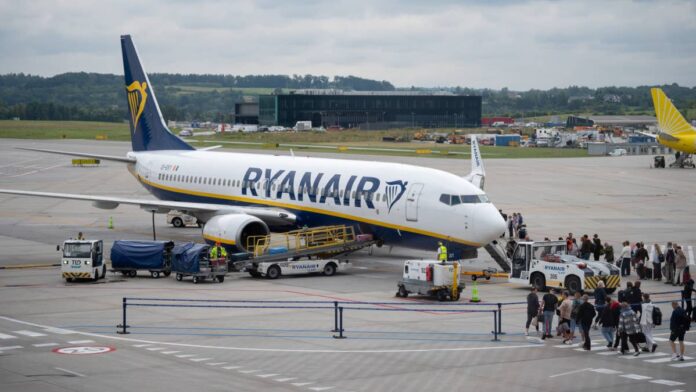 Ryanair’s boss just said something travelers and investors should pay attention to.
At the airline’s annual general meeting in Dublin, chief executive <a href="https://investor.ryanair.com/sustainability/governance/executive-officers/">Michael O’Leary</a> warned that <strong>airfares could rise sharply</strong> next year if oil prices stay high.
For a company whose main selling point is cheaper seats, that change is worth monitoring.
The timing matters too. The comments land at a time when Ryanair’s U.S.-listed shares (RYAAY) are trading <strong>close to their lowest level in a year</strong>.
What O’Leary told shareholders about Ryanair airfares
O’Leary said fares should be modestly lower in the <strong>July-to-September quarter</strong>, but the <strong>December and March quarters</strong> remain unpredictable.
The problem is <strong>fuel</strong>.
“If oil prices remain high into next year, I think there will be a significant uplift in airfares, and we would hope to avoid that,” he said, according to <a href="https://www.cnbc.com/2026/09/10/ryanair-airfare-prices-oil-iran-war.html">CNBC</a>.
Ryanair has guaranteed no extra fuel charges. Even so, O’Leary said fares may still rise if competitors raise prices first, <a href="https://www.reuters.com/business/aerospace-defense/ryanair-ceo-sees-significant-rise-airfares-if-oil-prices-remain-high-into-2027-2026-09-10/">Reuters</a> reported.
How Ryanair makes money and why fuel costs matter so much
Ryanair is <strong>Europe’s largest low-cost airline</strong>. It sells cheap base fares and earns extra from seat choices and priority boarding.
That business model runs on high passenger volume and low operating costs.
Fuel is one of its biggest expenses, so an increase in oil prices affects its profit.
Brent crude has now gone <strong>above $100 a barrel</strong> due to the U.S. and Iran conflict, and jet fuel has climbed to <strong>about $140 a barrel</strong>, according to <a href="https://aviationweek.com/air-transport/airlines-lessors/ryanair-lowers-traffic-target-unhedged-fuel-costs">Aviation Week</a>.
Ryanair CEO Michael O’Leary warned of higher airfares in 2027 if oil prices stay elevated.<a href="https://www.gettyimages.com/detail/2286937946">NurPhoto / Getty Images</a>
Why Ryanair is better protected than most rivals this winter
Ryanair went into this oil crisis with a strong hedge, which locks in fuel prices in advance.
O’Leary said the airline is “better hedged than almost any other airline in Europe.”
Ryanair has secured <strong>80% of its fuel needs</strong> up until the end of <strong>March 2027</strong> at <strong>about $67 a barrel</strong>.
<strong>More Airline Coverage:</strong>
<strong><a href="https://www.thestreet.com/investing/stocks/dal-warren-buffett-berkshire-delta-air-lines-stake">Warren Buffett’s Berkshire raises stake in world’s largest airline</a></strong>
<strong><a href="https://www.thestreet.com/travel/another-airline-cuts-snacks-and-beverages-on-hundreds-of-flights">Another airline cuts snacks and beverages on hundreds of flights</a></strong>
<strong><a href="https://www.thestreet.com/travel/united-airlines-to-exit-market-until-march-2027-offers-refunds">United Airlines to exit market until March 2027, offers refunds</a></strong>
The company has also locked in an <strong>additional 15%</strong> at <strong>$85 a barrel</strong> for the 2028 fiscal year, <a href="https://www.rte.ie/news/business/2026/0910/1591022-ryanair-warns-of-higher-fares-at-agm/">RTE</a> reported.
That is well below today’s spot price. So Ryanair’s costs stay mostly predictable into next spring.
What the winter flight cuts and first-quarter profit drop reveal
Ryanair’s unhedged fuel has more than doubled in price, so it <strong>reduced winter flying</strong> to limit the damage.
The airline cut its full-year passenger target to <strong>214 million from 216 million</strong>.
It expects the move to reduce winter losses by <strong>€70 million to €100 million</strong>, the <a href="https://www.irishtimes.com/business/2026/09/02/ryanair-cuts-winter-capacity-as-unhedged-jet-fuel-costs-bite/">Irish Times</a> reported.
The strain of the profit squeeze was already showing. First-quarter profit after tax <strong>fell 34%</strong> to <strong>€538 million</strong>, even as traffic <strong>rose 6%</strong>, according to <a href="https://aviationweek.com/air-transport/airlines-lessors/ryanair-lowers-traffic-target-unhedged-fuel-costs">Aviation Week</a>.
In Q1, average fares <strong>dropped about 6%</strong>.
Why Ryanair thinks weaker airlines could struggle to survive
O’Leary said less-hedged rivals could struggle to keep capacity, or even survive the winter, if high fuel prices continue, <a href="https://www.aerotime.aero/articles/ryanair-warns-airlines-winter-fuel-crisis">AeroTime</a> reported.
If some weaker carriers pull back or fail, Ryanair could pick up their passengers and rebuild pricing power once fuel calms down.
Budget-focused travelers also tend to switch to cheaper airlines when money is tight.
What Ryanair investors should watch from here
RYAAY trades <strong>near $53</strong>, <strong>down about 26%</strong> year to date and close to its <strong>52-week low of $53.14</strong>.
That’s well under its <strong>52-week high of $74.24</strong>.
Still, Wall Street stays positive.
Key points for RYAAY investors
Analysts rate RYAAY a <strong>Strong Buy</strong>, with an <a href="https://www.thestreet.com/quote/RYAAY">average price target</a> at <strong>$68.45</strong>.
Ryanair is hedged on 80% of fuel through March 2027 at about $67 a barrel.
Winter capacity cuts aim to save €70 million to €100 million.
Fares for the July to September quarter are set to be modestly lower year over year.
For now, winter pricing is unclear. But Ryanair’s fuel hedge and strong balance sheet leave it better placed than most peers.
<strong><a href="https://www.thestreet.com/travel/low-cost-airline-launches-easier-way-to-get-to-sri-lanka">Related: Low-cost airline launches easier way to get to Sri Lanka</a></strong>