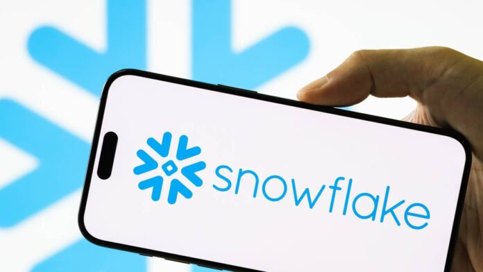 <a href="https://www.thestreet.com/dictionary/w/wall-street">Wall Street</a> does not usually turn on a stock this fast.Earlier this year, <strong>Snowflake</strong> (<a href="https://www.thestreet.com/quote/SNOW">SNOW</a>) was one of the names investors turned away from when they decided artificial intelligence might break the software business. SNOW stock fell hard, and the story around it was almost entirely about what <a href="https://www.thestreet.com/tag/artificial-intelligence">AI</a> could take away.On July 29, one of the banks that helped shape that worry told clients it had the whole thing backwards.Snowflake <strong>shares climbed</strong> on the news, and the number attached to the call stood out even in a market full of aggressive AI targets. The price target sits <strong>above every other estimate</strong> on Wall Street, and it rests on an idea about where enterprise spending is heading next.The reasoning behind that number, and what it would take for the stock to actually get there, is worth a closer look.Wells Fargo just set the highest Snowflake price target on Wall Street<strong>Wells Fargo</strong> told Snowflake investors something on July 29 that the bank itself would have rejected a few months ago.Artificial intelligence, the same force blamed for gutting the stock earlier this year, is now the reason to buy it.The bank kept its <strong>Overweight rating</strong> and lifted its price target to <strong>$500 from $320</strong>, <a href="https://www.cnbc.com/2026/07/29/wells-fargo-says-this-software-stock-has-85percent-upside.html">CNBC</a> reported. <strong>More AI Coverage:</strong><a href="https://www.thestreet.com/investing/bloom-energy-stock-nvidia-revenue-growth"><strong>Overlooked AI stock is growing faster than Nvidia </strong></a><a href="https://www.thestreet.com/technology/nvidia-ceo-takes-al-fight-from-x-to-capitol-hill"><strong>Nvidia CEO takes Al fight from X to Capitol Hill</strong></a><a href="https://www.thestreet.com/investing/stocks/analyst-upgrades-google-alphabet-stock-buy-ai-cloud-growth"></a><a href="https://www.thestreet.com/investing/stocks/analyst-upgrades-google-alphabet-stock-buy-ai-cloud-growth"><strong>target </strong></a><a href="https://www.thestreet.com/investing/stocks/analyst-upgrades-google-alphabet-stock-buy-ai-cloud-growth"><strong>on key move</strong></a><a href="https://www.thestreet.com/investing/stocks/ubs-raises-amd-stock-price-target-730-advancing-ai-server-cpu"><strong>UBS raises AMD stock price target to $730 after AI Day</strong></a>That is the highest target on Wall Street, and it implies <strong>close to 85% upside</strong> from the July 28 close of <strong>$270.36</strong>.Analyst <strong>Ryan MacWilliams</strong> framed the call in four words: "The game has changed."His point is that AI agents are pushing customers to spend more on Snowflake, not less, and that most investors have the direction of that trend backwards.
Snowflake shares jumped after Wells Fargo set a $500 price target, the highest on Wall Street.<a href="https://www.gettyimages.com/detail/2231786805">Cheng Xin / Getty Images</a>
Why Wells Fargo flipped its Snowflake argument on AIEarlier this year, investors worried that AI would break the software-as-a-service model, the subscription approach that charges companies per user or per seat. Investors were afraid that if AI agents replace human seats, seat-based software collapses.That fear had a nickname on Wall Street: the <strong>SaaSocalypse</strong>. It sent Snowflake <strong>down more than 44%</strong> at one point.MacWilliams now argues the second quarter proved the opposite. As Snowflake's <strong>AI coding tools and agents</strong> came online for customers, <strong>spending went up</strong> rather than down.A Wells Fargo survey of Snowflake customers found three things happening at once:AI is driving businesses to spend more on the platform than beforeProduct usage is climbing as customers lean on those toolsCompanies are uploading more of their data to Snowflake so it can feed their AI systemsThat last point matters most. Snowflake <strong>stores the data that AI models need</strong> to be useful inside a business, which turns the AI boom into a demand driver instead of a threat.What "no capex, no model dependence" actually means for youMacWilliams described Snowflake as a near-term AI beneficiary "without capex requirements or model dependence."That line carries more weight than it looks.<strong>Capex</strong>, short for capital expenditure, is the money a company spends on physical infrastructure like data centers and chips. <strong><a href="https://www.thestreet.com/investing/amd-stock-gets-a-new-reason-to-watch-from-bank-of-america">Related: AMD stock gets a new reason to watch from Bank of America</a></strong>Firms racing to build their own AI models are spending enormous sums on it, which eats into cash flow.Snowflake sits above that spending. It does not need to build the most expensive infrastructure or bet on one winning AI model. It can benefit from rising AI usage without carrying the same costs.For an investor, that is the practical appeal. Snowflake can ride demand from every model its customers choose, rather than living or dying by a single one.How far Snowflake stock has already runThe market has been closing this gap for months, well before the July 29 note.Snowflake has <strong>climbed about 24.76%</strong> year to date, and shares <strong>jumped more than 5%</strong> on <strong>July 29</strong> to <strong>about $284.75</strong> after the upgrade. It reached an <strong>intraday high</strong> near <strong>$289.81</strong>.That recovery gives the $500 target its context. The stock fell hard, found a floor, and has been grinding back as the AI-disruption fear faded.Snowflake's numbers have supported the move. In the fiscal first quarter, <a href="https://investors.snowflake.com/financials/quarterly-results/default.aspx">Snowflake</a> reported revenue of <strong>$1.39 billion</strong>, <strong>up 33%</strong> from a year earlier.Product revenue also <strong>rose 34%,</strong> and remaining performance obligations <strong>climbed 38%</strong> to <strong>$9.21 billion</strong>.MacWilliams believes that combination deserves a higher premium. He said Snowflake should trade closer to <strong>Cloudflare</strong> (<a href="https://www.thestreet.com/quote/NET">NET</a>) and <strong>CrowdStrike</strong> (<a href="https://www.thestreet.com/quote/CRWD">CRWD</a>), which carry forward earnings multiples of <strong>204 and 139</strong>, against Snowflake's <strong>127</strong>, <a href="https://www.cnbc.com/2026/07/29/wells-fargo-says-this-software-stock-has-85percent-upside.html">CNBC</a> reported. The case that could still go wrongA $500 target is a bet, not a promise, and the risks are real.<strong>Competition</strong> is the clearest one. In June, BNP Paribas analyst <a href="https://www.tipranks.com/experts/analysts/stefan-slowinski">Stefan Slowinski</a> noted that <strong>Databricks</strong> keeps gaining ground in Snowflake's core market for SQL.<strong>Valuation</strong> is the other. At 127 times forward earnings, Snowflake is priced for strong execution. Any slip in growth could compress that multiple quickly, the same trap that has weighed on <strong><a href="https://www.thestreet.com/quote/PLTR">Palantir</a></strong> (<a href="https://www.thestreet.com/quote/PLTR">PLTR</a>) even as its revenue climbs.MacWilliams holds a modest track record by some analyst rankings, so the $500 figure is a high-conviction call rather than a consensus one.What Snowflake investors should watch nextThe bull case now rests on a single question: does AI keep pulling spending toward Snowflake, or does it eventually pull spending away?A few concrete markers will answer that question. <strong>Next earnings</strong>: whether product revenue growth holds above 30% and net revenue retention stays strong<strong>Databricks pressure</strong>: any sign that competition is slowing Snowflake's data-warehouse momentum<strong>AI usage data</strong>: confirmation that customers keep uploading more data and running more AI workloads on the platformFor readers considering the stock, Wells Fargo's $500 call is just the boldest version of the same bet everyone's making now: that AI grows Snowflake's business instead of shrinking it.If that call holds through the next earnings report, the highest target on Wall Street starts to stand out less. If the bet fails, a stock trading at 127 times earnings has a long way to fall.<strong><a href="https://www.thestreet.com/investing/micron-gives-wall-street-reason-to-rethink-ai-winners">Related: Micron gives Wall Street reason to rethink AI winners</a></strong>