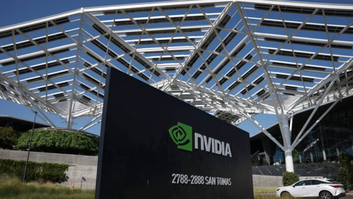 Back in 2020, <a href="https://www.thestreet.com/quote/NVDA">Nvidia</a> dropped $6.9 billion on a company most people had never heard of, Mellanox, an Israeli outfit that made networking switches and adapters. At the time, it barely registered. <a href="https://www.thestreet.com/personalities/nvidia-founder-huang-net-worth">Jensen Huang</a> was buying GPUs, building the chip story, and a networking company felt like a rounding error next to that. Six years on, the rounding error just beat Cisco.Nvidia (<a href="https://www.thestreet.com/quote/NVDA">NVDA</a>) passed Cisco in data center Ethernet switching revenue for the first quarter of 2026, the first time that's happened. Not a small corner of Cisco's business either; it's the category Cisco basically built. <a href="https://seekingalpha.com/news/4604669-nvidia-takes-no-1-spot-in-data-center-ethernet-switching-by-revenue-in-q1-idc">Seeking Alpha</a> reported the figures, pulled from IDC's latest tracker. Nvidia's switching revenue grew 192.7% year over year to $2.1 billion, good for a 21.5% share of a data center segment that itself grew 61% to $10 billion. The wider Ethernet switch market, campus networks included, hit $15.4 billion, up almost 40%.<strong>Why everyone's suddenly fighting over switches</strong>The driver behind all of it is simple enough. Training an <a href="https://www.thestreet.com/tag/artificial-intelligence">AI</a> model means thousands of GPUs constantly talking to each other, and somebody has to wire that conversation. A year ago Nvidia was bringing in roughly $1.46 billion a quarter from data center Ethernet switching. The quarter after, $2.3 billion. This climb didn't happen overnight, it's been building for two years, and Q1 2026 is just when it finally crossed the finish line ahead of Cisco and Arista Networks, the two names that have owned this market for ages.<strong>More Nvidia:</strong><a href="https://www.thestreet.com/investing/stocks/5-star-analyst-revisits-nvidia-stock-on-peculiar-gpu-demand-situation"><strong>5-star analyst revisits Nvidia stock on peculiar GPU demand situation</strong></a><a href="https://www.thestreet.com/investing/stocks/bank-of-america-updates-nvidia-stock-forecast-after-cfo-meeting"><strong>Bank of America resets Nvidia stock forecast after CFO meeting</strong></a><a href="https://www.thestreet.com/investing/stocks/nvidia-ceo-sends-strong-message-to-stock-market-investors"><strong>Nvidia CEO sends strong message to stock market investors</strong></a><a href="https://techcrunch.com/2026/03/18/nvidia-networking-division-building-a-multibillion-dollar-behemoth-to-rival-its-chips-business/">TechCrunch</a> traced the whole thing back to that Mellanox deal. Kevin Deierling, who runs networking at Nvidia and joined through the acquisition, said the bet looked strange even to him at the time. "When Jensen bought Mellanox in 2020, he saw that was the missing piece to make GPUs a complete package," Kevin Cook, a senior equity strategist at Zacks Investment Research, told TechCrunch, describing how the deal is now viewed inside the industry.<strong>The product most people outside networking have never heard of</strong>What's actually doing the work is something called Spectrum-X. Training clusters need to move enormous amounts of data between thousands of GPUs without delay, and regular Ethernet was never built for that kind of pressure. The old fix was InfiniBand, faster, but pricier and locked tightly into Nvidia's own world already.Spectrum-X splits the difference. Nvidia pairs its switches with BlueField processing units and custom cabling to get close enough to InfiniBand speeds that customers stop worrying about the gap. Cheaper than InfiniBand, familiar enough that IT teams aren't relearning everything from scratch, fast enough to actually run AI workloads at scale. Customers, including Microsoft Azure, Oracle Cloud, CoreWeave, Google Cloud, and Meta, have adopted the platform, Benzinga reported, citing Nvidia CFO Colette Kress.
The driver behind all of it is simple enough. Training an AI model means thousands of GPUs constantly talking to each other, and somebody has to wire that conversationSullivan/Getty Images
<strong>Switching is only half the story, maybe less</strong>Here's where it gets bigger. Switching is one slice of what Nvidia now calls its networking division, alongside NVLink and InfiniBand. Combined, that division pulled in $11 billion in revenue last fiscal quarter, up 263% year over year. Full year total came to $31 billion, up more than tenfold from fiscal 2021.Those numbers are why Jensen Huang made a claim during Nvidia's <a href="https://www.thestreet.com/dictionary/e/earnings-call">earnings call</a> that would've gotten laughed at a few years back."We're now the largest networking company in the world," Nvidia's CEO said, <a href="https://finance.yahoo.com/news/nvidia-ceo-were-now-the-largest-networking-company-in-the-world-184004945.html">Yahoo Finance</a> reported. Cisco's most recent quarterly networking revenue came in well below that single quarter. Cook summed up the comparison for TechCrunch this way: Nvidia's networking arm "does in one quarter what Cisco's business does in a year."You'd expect that to dominate every earnings call. It doesn't. Blackwell GPU sales soak up the spotlight, and even gaming, Nvidia's original business and now a third the size of networking, still pulls more headlines. The networking business just keeps compounding quietly while everyone watches the chip numbers.<strong>What it means if you hold Cisco, Arista, or Nvidia stock</strong>Cisco spent thirty years owning this exact market. Arista did the same more recently and has actually held up reasonably well, leaning hard into its own AI networking pitch instead of folding. But neither company makes GPUs, and that's the structural problem nobody's solving with a faster switch. The deals Nvidia is winning aren't decided on switch specs alone. They're decided because Nvidia can sell the chip and the network that connects it as a single bundle, and Cisco and Arista simply can't match that without a GPU business of their own.For Nvidia shareholders, the GPU pitch has been told so many times it barely registers anymore. Networking is the more interesting thread now, mostly because every dollar earned there used to belong to somebody else. Add sovereign AI revenue and core compute into the picture, and Nvidia isn't riding one growth wave anymore. It's riding three, which makes any single slowdown a lot easier to absorb than it would've been a few years ago.None of this means Cisco or Arista are going away. Both still serve enterprise customers who aren't building AI clusters, the day-to-day campus and branch networking that has nothing to do with GPUs, and that market grew a respectable 12.3% in the same quarter. But the part of the business that's growing fastest, the part everyone wants to talk about on earnings calls, is the one Nvidia just took the top spot in. That's the part that matters most for where these stocks go from here.<strong><a href="https://www.thestreet.com/markets/nvidias-25b-bond-deal-sends-investors-a-clear-signal">Related: Nvidia's $25B bond deal sends investors a clear signal</a></strong>