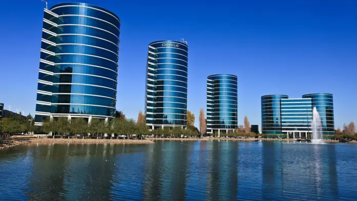 Oracle's business had the best year in its history and its shareholders had one of the worst. That is not a figure of speech. Over the twelve months to 31 May 2026, Oracle's contracted backlog — the revenue it has already signed and not yet delivered — rose from <strong>$137.8bn to $638.0bn</strong>, a 363% increase, according to the company's own 10-K filings. Over almost exactly the same window the shares fell <strong>39.2%</strong>. ORCL trades at <strong>$142.45</strong>, down 56.6% from its closing peak of $328.33 on 10 September 2025. A bull case at $245 needs 72% upside and sits on the analyst consensus target of $246.43. A bear case at $95 needs a 33% decline.
The reason both cases are live comes down to a single line in the cash flow statement that most coverage skips. In fiscal 2026 Oracle spent <strong>$55.7bn on property, plant and equipment</strong> while generating <strong>$32.0bn in operating cash flow</strong>. That is capital expenditure running at <strong>174% of operating cash flow</strong>, and it means free cash flow was roughly <strong>negative $23.7bn</strong> for the year. For scale, FinanceFeeds reported that the five US hyperscalers are collectively expected to spend around 93% of operating cash flow on capex in 2026, as part of <a href="https://financefeeds.com/htx-says-ais-697-billion-spending-boom-has-entered-its-payback-phase/">AI's $697bn spending boom entering its payback phase</a>. Oracle is running at nearly double the ratio of the group it is trying to catch — including <a href="https://financefeeds.com/amazon-amzn-stock-prediction-330-bull-185-bear/">Amazon</a>, whose own capex plan runs to roughly $220bn. The backlog is real, the cash to build for it is being borrowed, and the market has decided it does not want to fund the gap at 2025 prices.
Key facts
<strong>ORCL: $142.45</strong>, down 2.74% on the session — StockAnalysis, close of 24 August 2026
<strong>Backlog (remaining performance obligations) of $638.0bn</strong> at 31 May 2026, up from $137.8bn a year earlier — Oracle 10-K via SEC EDGAR, filed 22 June 2026
<strong>FY2026 capex $55.7bn against $32.0bn operating cash flow</strong>, implying roughly −$23.7bn free cash flow — Oracle 10-K via SEC EDGAR
<strong>Revenue $67.36bn (+17.3%), net income $16.98bn (+37.3%), EPS $5.83 (+34.3%)</strong> on a trailing basis — StockAnalysis, 25 August 2026
<strong>Total debt $167.4bn, up from $109.0bn a year earlier</strong>; net debt $135.5bn — StockAnalysis balance sheet data, 25 August 2026
<strong>Trades at 24.4x trailing and 17.7x forward earnings</strong>, with a $2.00 dividend yielding 1.40% — StockAnalysis, 25 August 2026
<strong>Analyst consensus: Buy, $246.43 target</strong>, implying 73% upside — StockAnalysis, 25 August 2026
What actually happened to the share price
The chart of the last twelve months is one of the more dramatic mega-cap round trips in recent memory.
Oracle closed at $328.33 on 10 September 2025, the day after the quarter in which backlog jumped from $137.8bn to $455.3bn. That single disclosure re-rated the company from an enterprise software incumbent into an AI infrastructure play, and the shares gapped accordingly. Everything since has been the market re-underwriting that decision. The stock bottomed at $114.99 on 24 July 2026, staged a recovery to the mid-150s, and has drifted back to $142.45.
What makes the decline unusual is that it has happened <em>through</em> a run of good results. Oracle has beaten consensus earnings per share in each of its last four quarters: $1.47 against $1.35 expected, then $2.26 against $1.50, then $1.79 against $1.55, then $2.11 against $1.89 in the fourth quarter reported on 10 June 2026. Four beats, two of them substantial, and a share price down 39% over the period. That pattern is not unique to Oracle this cycle — FinanceFeeds found the same disconnect at Nvidia, where the stock <a href="https://financefeeds.com/bitcoin-100k-after-nvidia-earnings-why-the-link-is-a-myth/">fell in the five sessions after each of its last four earnings beats</a>. Whatever is driving this, it is not an earnings disappointment.
The next test comes soon. Oracle has reported first-quarter results in the second week of September in each of the last several years — 9 September in both 2024 and 2025 — and the current estimate is <strong>8 September 2026</strong>, with consensus at $1.67 of EPS on about $19.13bn of revenue. That date is an estimate rather than a company-confirmed announcement at the time of writing, so treat it as approximate.
What the analysts and the practitioners are actually saying
The independent commentary has split along a clean line: those focused on the multiple, and those focused on the cash.
<strong>Parkev Tatevosian, CFA</strong>, in a <a href="https://www.youtube.com/watch?v=ya28Xyqv0bU">22 August analysis</a>, made the valuation case while explicitly conceding the cash problem. He noted that Oracle "is now trading at a forward price to earnings of just 13.5 which is lower than where the stock has traded for historically" — his own calculation, which runs below the 17.7x forward multiple StockAnalysis shows on current-year estimates, so the exact figure depends on which fiscal year you anchor to. More importantly, he flagged that "Oracle is forecasting revenue growth to accelerate to 34% in fiscal year 2027" while "the forecast suggests that Oracle's cash flow will remain significantly negative in fiscal year 2027, even though the company's revenue will likely" continue climbing. That is the bull and bear case in one breath: accelerating growth funded by negative cash flow.
<strong>Sven Carlin, Ph.D.</strong> made the long-horizon argument in a <a href="https://www.youtube.com/watch?v=ktY0IrrdSM8">4 August video</a> viewed more than 14,000 times, reaching for the obvious historical parallel: "If we look at Oracle in the 2000s, crashed 80% and then it kept doing its thing." His framing is that the capex cycle has to finish before the equity works — "once profitability of free cash flow returns significantly, that year companies like Meta, Amazon, and probably Oracle will do extremely well." That is a thesis with a timing problem attached rather than a valuation one.
On the bearish side, commentary circulating in early August focused on Oracle's purchase commitments and on credit risk tied to its largest AI customers. A widely shared claim attributing a specific bearish call on Oracle to investor Michael Burry could not be independently verified for this article, and is noted here only because it shaped sentiment, not as an established fact. The underlying concern, however, is verifiable from Oracle's own filings: the company has taken on $58bn of incremental debt in a single year to serve contracts whose counterparties are concentrated and, in several cases, themselves loss-making.
The two cases, priced
Here is what each scenario requires in multiple terms, using the $8.05 of forward earnings per share implied by the current price and forward multiple.
ScenarioPriceMove from $142.45Implied market capForward P/E
52-week closing high$328.33+130.5%~$945bn~40.8x
Analyst consensus target$246.43+73.0%~$710bn~30.6x
<strong>Bull case</strong>$245+72.0%~$706bn~30.4x
Today$142.45—$410bn17.7x
52-week closing low$114.99−19.3%~$331bn~14.3x
<strong>Bear case</strong>$95−33.3%~$274bn~11.8x
The table exposes what is genuinely different about Oracle compared with the speculative end of the AI trade. Unlike a pre-revenue quantum or fusion story, <strong>there is a price at which Oracle is objectively cheap on earnings</strong>. At $95 the company would trade near 11.8 times forward earnings while growing EPS in the mid-thirties — a multiple normally reserved for businesses in decline. Even at today's $142.45 the stock sits at 17.7x forward, below the market multiple, for a company whose net income grew 37.3%.
The catch is that earnings multiples assume the earnings convert to cash, and right now they emphatically do not. Oracle earned $16.98bn of net income and produced negative free cash flow of roughly $23.7bn, because $55.7bn went into data centres. A multiple is only a valuation tool when the E turns into distributable cash within a reasonable horizon. For Oracle, that horizon is the entire debate.
The structural tension: a backlog you cannot bank
Remaining performance obligations are the most misunderstood number in this story, and both bulls and bears overreach on them.
The bull overreach is treating $638.0bn as if it were money in the bank. It is not — it is contracted revenue that Oracle must still build capacity to deliver. Against trailing revenue of $67.36bn, that backlog represents roughly <strong>9.5 years of current revenue</strong>, which tells you immediately that it cannot be converted without an enormous, sustained construction programme. The $55.7bn of capex is not optional spending; it is the cost of honouring the backlog. Every dollar of RPO carries a capital obligation behind it.
The bear overreach is dismissing the backlog as vapour. It is contracted, it is disclosed in audited filings, and it grew again in the most recent period — from $552.6bn at 28 February to $638.0bn at 31 May 2026. Companies do not sign $638bn of obligations they expect to walk away from, and Oracle's auditors would have something to say about the disclosure if the counterparties were not creditworthy in aggregate.
The honest reading sits between the two. The backlog converts to revenue over many years, at a gross margin that is lower than Oracle's traditional software business, funded by debt that has grown from $109.0bn to $167.4bn in twelve months. The equity is the residual claim on that spread, which is why it moves so violently. Note what the debt does to the arithmetic: Oracle's market capitalisation fell 37.9% over the year, but adding net debt of $135.5bn, its enterprise value fell closer to 28%. Because the debt grew while the equity shrank, <strong>shareholders absorbed roughly 1.35 times the decline in the value of the whole business</strong>. Leverage cuts in both directions, and on the way down it has been cutting.
What happens next
<strong>One: the September quarter is about capex guidance, not EPS.</strong> Consensus is $1.67 on roughly $19.13bn of revenue, and Oracle has beaten four quarters running, so another EPS beat should be the base case. It will not matter much. The number that moves the stock is the fiscal 2027 capital expenditure figure and any commentary on when free cash flow turns positive. A capex guide above the roughly $55.7bn run rate would confirm the bear thesis that the build never stops; a guide that flattens is the single most plausible catalyst for a re-rating toward the bull case.
<strong>Two: the bull case depends on multiple expansion, not earnings.</strong> Reaching $245 requires roughly 30x forward earnings against today's 17.7x. Since consensus EPS is unlikely to move 70% in a year, essentially the entire move has to come from investors paying more for the same earnings. That happens when free cash flow inflects, and on the company's own trajectory that is a fiscal 2028 event at the earliest. The analyst consensus target of $246.43 is therefore a call on sentiment normalising, not on a new forecast.
<strong>Three: the bear case runs through the credit market, not the equity market.</strong> With $167.4bn of total debt and negative free cash flow, Oracle's funding cost is now a live variable. A downgrade, a widening in its spreads, or a stumble at one of its large AI counterparties would force the equity to reprice regardless of what the income statement shows. Watch the debt, not the EPS line — that is where the $95 scenario originates, and it would most likely arrive through the July low of $114.99 failing rather than through a bad quarter.
The practical framing: Oracle is no longer a software company being valued on software metrics, and it is not yet an infrastructure company producing infrastructure cash flows. It is in the expensive middle of a transition it has already sold $638bn of contracts to justify. At 17.7x forward earnings the market is pricing meaningful execution risk into a business growing earnings in the mid-thirties. That is either the opportunity or the warning, and the September capex guide is the first real chance to find out which. For a comparison of how the market is pricing the picks-and-shovels side of the same build-out, see FinanceFeeds' <a href="https://financefeeds.com/marvell-mrvl-stock-prediction-340-bull-150-bear/">Marvell bull-versus-bear breakdown</a>.
Frequently asked questions
What is the Oracle stock prediction for 2026?
The bull case is $245, matching the analyst consensus target of $246.43 and implying 72% upside from $142.45. The bear case is $95, a 33% decline that would take the stock below its July 2026 low of $114.99. The nearest catalyst is first-quarter fiscal 2027 results, currently estimated for 8 September 2026.
Why has Oracle stock fallen so much?
ORCL is down 56.6% from its closing peak of $328.33 in September 2025 despite beating earnings in four consecutive quarters. The decline reflects the cost of its AI build-out rather than weak results: fiscal 2026 capital expenditure of $55.7bn against $32.0bn of operating cash flow produced roughly negative $23.7bn of free cash flow, funded by debt that rose from $109.0bn to $167.4bn.
What is Oracle's backlog and does it matter?
Oracle's remaining performance obligations reached $638.0bn at 31 May 2026, up from $137.8bn a year earlier. That is roughly 9.5 years of current revenue. It is contracted and disclosed in audited filings, but it converts to revenue only as Oracle builds the data centre capacity to deliver it, which is precisely what the capital expenditure is funding.
Is Oracle stock cheap at current levels?
On earnings, yes by historical standards: 24.4x trailing and 17.7x forward, for a company that grew net income 37.3% and EPS 34.3%. On cash flow, no — free cash flow was roughly negative $23.7bn in fiscal 2026. Whether the multiple is cheap depends entirely on when that cash flow inflects.
When does Oracle report earnings?
Oracle has reported first-quarter results in the second week of September in recent years, including 9 September in both 2024 and 2025. The current estimate for Q1 fiscal 2027 is 8 September 2026, with consensus of $1.67 EPS on about $19.13bn of revenue. This date had not been confirmed by the company at the time of writing.
What would invalidate the bull case for Oracle?
Fiscal 2027 capital expenditure guidance above the current $55.7bn run rate, with no visible path to positive free cash flow, would confirm that the build-out keeps consuming the earnings. A credit downgrade or trouble at a major AI counterparty would do the same faster, since Oracle now carries $167.4bn of total debt. This article is analysis, not investment advice.