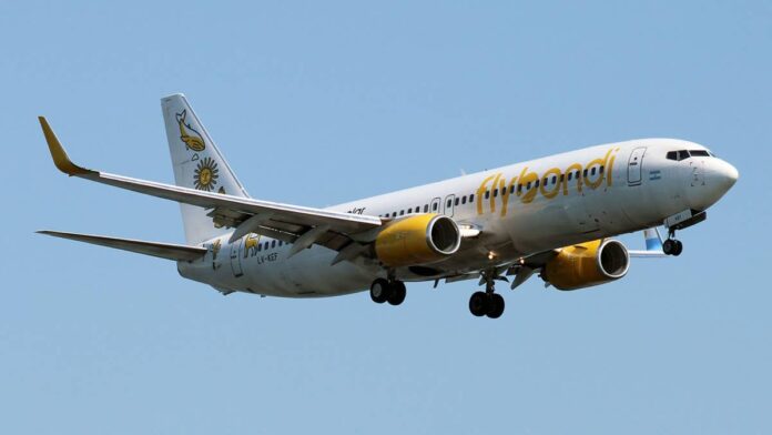 Since the start of the summer, Argentine <a href="https://www.thestreet.com/travel/what-is-the-best-low-cost-airline-usa">budget airline</a> Flybondi has faced severe operational challenges as <a href="https://www.thestreet.com/travel/airline-spends-four-days-without-flying-as-bankruptcy-rumors-swirl">rumors of a potential future bankruptcy</a> continue to swirl.Once the second-largest airline in the country after state-owned flag carrier Aerolíneas Argentinas, Flybondi has kept all but one Boeing 737 plane grounded since June 2026 during what is usually a peak travel season in the South American country. As the <a href="https://www.thestreet.com/travel/low-cost-airline-ceo-gives-stark-warning-about-jet-fuel">price of jet fuel skyrocketed</a> over the war in Iran, most flights became unprofitable to run.Amid hundreds of flight cancellations both within Argentina and to the neighboring nation of Brazil, Brazilian authorities have blocked the airline from selling any new flights into their country, <a href="https://www.riotimesonline.com/flybondi-sales-blocked-in-brazil-after-79-of-flights-axed/">The Rio Times</a> reported. Authorities also issued an ultimatum that Flybondi must prove operational viability or suspend its main route between Ezeiza International Airport (EZE) in Buenos Aires and Galeão-Antonio Carlos Jobim International Airport (GIG) in Rio de Janeiro by Aug. 3. New tickets for regional cities Florianópolis, Maceió, and Salvador already cannot be sold, and unless the situation changes, the airline will need to phase out all routes in a way that minimizes disruption to those with existing tickets.Brazilian authorities block airline Flybondi from selling new flight tickets into countryAccording to the report by Brazil's National Civil Aviation Agency (ANAC) that influenced the decision to restrict the airline's presence in the country, Flybondi had already <a href="https://www.thestreet.com/travel/airline-cancels-almost-all-flights-passengers-stranded">canceled more than 79% of its flights</a> into Brazilian cities between July 1 and July 27, <a href="https://www.riotimesonline.com/flybondi-sales-blocked-in-brazil-after-79-of-flights-axed/">The Rio Times</a> confirmed. On certain days in July, the airline has gone a full day without operating a single flight, <a href="https://aviationweek.com/air-transport/airlines-lessors/argentinas-flybondi-faces-mounting-pressure">Aviation Week</a> noted.<strong><a href="https://www.thestreet.com/travel/another-airline-shuts-down-after-lost-license-cancels-all-flights">Related: Another airline closes after losing license, cancels all flights</a></strong>ANAC justified its decision citing the high risk "of a decline in the company's operational capacity and risks to passengers." Communications head Lucía Ginzo left his role at the company in late May as the carrier's future looks increasingly uncertain, <a href="https://aerospaceglobalnews.com/news/flybondi-crisis-deepens-ceo-quits-aircraft-shortages/">Aerospace Global News</a> noted.The airline first drew the attention of regulators after falling behind on paying employee salaries in March 2026, <a href="https://www.ch-aviation.com/news/165924-argentinas-flybondi-neglects-to-pay-company-salaries">ch-aviation</a> reported. In addition, local Argentine outlets are reporting that the company owes debts of more than $122.4 million to various vendors, according to <a href="https://airguide.info/airline-grounds-flights-for-four-days-amid-bankruptcy-fears/">Airguide</a>.
Argentine airline Flybondi launched in 2016.Flybondi
What is happening with Flybondi in July 2026?In Argentina, Flybondi continues to sell tickets and run some flights, despite a high rate of cancellations. The airline has <a href="https://www.thestreet.com/travel/another-airline-shuts-down-after-lost-license-cancels-all-flights">not issued a statement</a> on the ANAC restrictions in Brazil.<strong>More Travel News</strong>:<a href="https://www.thestreet.com/travel/airline-to-launch-unusual-new-flight-to-cayman-islands-from-the-u-s"><strong>Airline to launch unusual new flight to Cayman Islands from the U.S.</strong></a><strong><a href="https://www.thestreet.com/travel/there-is-a-very-cool-irish-version-of-swimming-pigs-in-the-bahamas">There is a very cool Irish version of swimming pigs in the Bahamas</a></strong><a href="https://www.thestreet.com/travel/unexpected-country-is-most-luxurious-travel-destination-for-2026"><strong>Unexpected country is most luxurious travel destination for 2026</strong></a><a href="https://www.thestreet.com/travel/low-cost-airline-launches-easier-way-to-get-to-sri-lanka"><strong>Low-cost airline launches easier way to get to Sri Lanka</strong></a><strong>Airlines that filed for bankruptcy </strong>in 2026:<strong>Spirit Airlines: </strong>The largest airline shutdown of the year occurred when Spirit Airlines <a href="https://www.thestreet.com/travel/as-spirit-shuts-down-competitors-step-in-with-first-rescue-fares">canceled all remaining flights</a> on May 2. Although the airline had filed for Chapter 11 protection twice before, the skyrocketing price of jet fuel dealt the final blow to its operations.<strong>Magnicharters: </strong>The <strong>Mexican low-cost airline </strong>canceled all of its flights until May 2026 in a shutdown that left thousands stranded.<strong>Starflite Aviation: </strong>Houston-based <strong>Starflite Aviation</strong> had its AOC license revoked in March 2026, amid FAA claims that <a href="https://www.thestreet.com/travel/airline-loses-license-over-false-pilot-records-all-flights-off">owners falsified pilot training records</a> to bypass safety audits.<strong>AlpAvia:</strong> Slovenian <strong>charter airline AlpAvia</strong> also shut down in March 2026 over financial problems.<strong>H-Bird</strong>: Charter airline <strong>H-Bird was declared bankrupt</strong> by a Swedish judge <a href="https://www.thestreet.com/travel/another-airline-declared-bankrupt-all-flights-off">after losing its operating license</a> at the end of 2025.<strong><a href="https://www.thestreet.com/travel/major-airline-cancels-81-flights-as-strike-looms-no-refunds">Related: Major airline cancels 81 flights as strike looms, no refunds</a></strong>