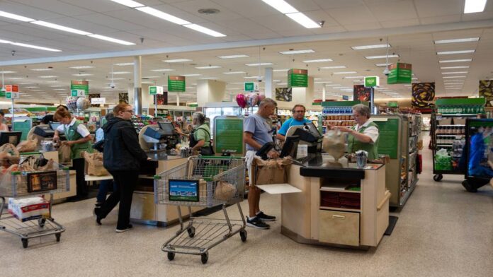 Publix is struggling to overcome a worrying change in customer behavior that is noticeably affecting the grocery chain. The company’s challenges come amid economic uncertainty and follow customer backlash it faced earlier this year over significant in-store changes.In March, Publix frustrated some customers when it <a href="https://www.thestreet.com/retail/publix-angers-customers-as-it-removes-convenient-payment-option">discontinued Publix Pay</a>, its contactless in-app payment option, which had been available since 2020.The company later sparked even more blowback in May, an even <a href="https://www.thestreet.com/investing/modern-day-boycotts-of-major-brands">boycott</a> threats, when it <a href="https://www.thestreet.com/retail/publix-ends-controversial-store-policy-after-frustrating-shoppers">quietly updated its open-carry policy</a>. Publix began posting signs inside and at the front entrances of its Florida stores, which asked only law enforcement to openly carry firearms in its locations. <strong>Publix sees sales decline as customers cut spending</strong>After facing controversy, Publix has revealed that its comparable store sales decreased by 0.5% year over year in the second quarter of 2026, according to a <a href="https://corporate.publix.com/newsroom/news-stories/08032026---publix-reports-second-quarter-2026-results-and-stock-price">recent press release</a>. Publix stated that the decrease in sales was “due to the impact of the MFP (maximum fair price) change and economic conditions impacting consumer spending.”The Medicare drug pricing program now includes a maximum fair price that limits the amount that pharmacies can be reimbursed for 10 select prescription drugs, a change that took effect on Jan. 1.When Publix’s comparable store sales remained flat in the first quarter of this year compared to the same time period in 2025, it also linked the lack of sales growth to the maximum fair price change. In the press release, Publix CEO Kevin Murphy suggested that the company is navigating economic headwinds. “I’m grateful for our associates’ commitment to our customers, our communities and each other, especially during this difficult economic time,” said Murphy.Many U.S. consumers have been more strict about how they spend their dollars amid rising grocery prices, a behavior that is posing challenges for grocery retailers nationwide. According to <a href="https://www.ers.usda.gov/data-products/food-price-outlook/summary-findings">the Consumer Price Index (CPI)</a>, which measures the monthly change in prices U.S. consumers pay, grocery prices have increased by 2.7% year over year in June. A <a href="https://www.relexsolutions.com/news/consumer-grocery-spending-changes-rising-costs-relex-survey/">recent survey from Relex Solutions</a> found that 61% of U.S. consumers have changed how much food they purchase due to these rising prices. Also, 40% are opting to shop at discount retailers more often to save money, and 54% say lower prices are the most important action retailers can take to help them manage rising costs.Amid this shift, 30% of retailers said that adapting to changing consumer demand is a significant challenge.“For retailers and manufacturers, the biggest risk is assuming consumers are responding to rising costs in the same way,” said Laurence Brenig-Jones, vice president of product and platform at Relex Solutions, in a <a href="https://www.relexsolutions.com/news/consumer-grocery-spending-changes-rising-costs-relex-survey/">press release</a>. “Consumers are making highly individualized decisions based on price, health goals, value and household priorities.” It is no surprise that Publix is starting to feel the impact of this growing consumer trend, as it has recently <a href="https://www.reddit.com/r/publix/comments/1tmtmlt/these_prices_are_getting_ridiculous/">faced criticism on social media for its high prices</a>. Some customers have even <a href="https://www.reddit.com/r/publix/comments/1nh0ru3/publix_is_price_gouging_us_massively_they_are/">accused the retailer of price gouging</a>.
<a href="https://www.shutterstock.com/image-photo/vero-beach-flusa-8219-check-out-1468827200?trackingId=29373153-ed39-482c-9993-d2defb7d025d">Shutterstock</a>
<strong>Publix faces growing competition amid the fight for customers </strong>As Publix struggles to navigate economic headwinds, it is facing increased competition in grocery retail. Recent data from <a href="https://www.numerator.com/?utm_source=google&utm_medium=cpc&utm_campaign=us-numerator&utm_term=numerator&utm_content=B&gad_source=1&gad_campaignid=23239118141&gbraid=0AAAAADun52IPNKsjbAB3a-pL3OX5Ytfxw&gclid=CjwKCAjw4dDTBhAqEiwAkHYmSnEDSvZnWvtUFrX1kAH6AEaU3ykvg1IV_UB6Dw0Sd9SbNG1wcDerMxoCW-8QAvD_BwE">Numerator</a>, which was shared with TheStreet, has revealed that Walmart is the No. 1 grocery retailer by <a href="https://www.thestreet.com/dictionary/m/market-share">market share</a>. The retailer reached 20.3% grocery market share in the 12 months ended June 30, an increase of 0.3% year over year, <a href="https://www.thestreet.com/quote/COST">Costco</a> ranks No. 2 on the list with 8.3% market share, up from 7.9% from a year ago. Kroger takes third place with 8.3% market share; Albertsons follows with 4.5%, while Publix lands in fifth place with 4.1%, the same share it captured during the same time period in 2025. More grocery chains have been cutting prices this year to attract customers to their stores. <strong>More Retail:</strong><a href="https://www.thestreet.com/retail/target-sees-unexpected-shift-in-customer-behavior-sales-boost"><strong>Target sees unexpected shift in customer behavior</strong></a><a href="https://www.thestreet.com/retail/publix-ends-controversial-store-policy-after-frustrating-shoppers"><strong>Publix faces consumer boycott threat after store policy change</strong></a><a href="https://www.thestreet.com/retail/ross-stores-ceo-eyes-a-change-that-risks-pushing-shoppers-away"><strong>Ross Stores CEO eyes a change that could drive away shoppers</strong></a>For example, in the first quarter of this year, Walmart rolled out 7,200 "rollbacks" across its locations. In July, it also <a href="https://corporate.walmart.com/news/2026/07/06/walmart-and-sams-club-lower-prices-to-help-customers-make-the-most-out-of-summer">announced nationwide summer price reductions and rollbacks</a> on seasonal and grocery items, a change that also impacted its Sam’s Club stores.Kroger took similar steps when it revealed plans earlier this year to slash prices on thousands of items in its stores. "The reality is, the basket has to come down," said Kroger CEO Greg Foran in an <a href="https://www.bloomberg.com/news/articles/2026-05-21/kroger-plans-biggest-price-cuts-in-years-to-take-on-walmart-costco?embedded-checkout=true">interview with Bloomberg in May</a>. "It needs to be across thousands of products, and it has to be something that passes the commonsense piece with customers."In a <a href="https://www.grocerydive.com/news/grocery-prices-inflation-supermarkets-food-retail/822563/">recent Grocery Dive report,</a><a href="https://www.linkedin.com/in/neilretail">Neil Saunders</a>, retail analyst and managing director of GlobalData Retail, said that offering consistently low prices is more effective at retaining customers than temporary price cuts. “Shoppers are putting in a lot more work to find deals, so temporary promotions and cuts do work to some extent, but they really want reassurance that their whole cart isn’t going to cost them an arm and a leg,” said Saunders.<strong><a href="https://www.thestreet.com/retail/walmart-costco-and-cvs-have-a-new-way-to-bring-you-back">Related: Walmart, Costco, and CVS have a new way to bring you back</a></strong>
