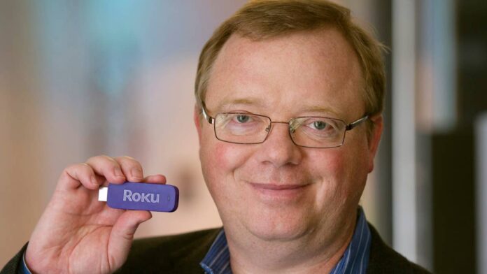 If you have a <strong>Roku</strong> device at home, and statistically, there's a good chance you do, your TV's home screen may soon have a new owner.<strong>Fox Corporation</strong><a href="https://www.foxcorporation.com/news/corp-press-releases/2026/fox-corporation-to-acquire-roku-inc/">announced</a> June 15 that it has reached a deal to buy Roku for $160 per share. That values the company at roughly $22 billion. The deal is expected to close in the first half of 2027, according to a company statement.For everyday TV viewers, the change may not be immediately obvious. But behind the scenes, it marks one of the biggest power moves in the streaming wars yet.<strong>Why does Fox want to acquire Roku?</strong>Roku (<a href="https://www.thestreet.com/quote/ROKU">ROKU</a>) isn't a streaming service like Netflix or <a href="https://www.thestreet.com/quote/DIS">Disney</a>+, but the software and hardware that sit between you and those services.Think of it as the front door to your TV. When you power on a Roku-enabled device, that home screen you see, with all the apps, recommendations, and ads, is Roku's platform. It reaches more than <a href="https://www.foxcorporation.com/news/corp-press-releases/2026/fox-corporation-to-acquire-roku-inc/">100 million households</a> globally and is installed in more than half of all U.S. homes with broadband internet. <strong><a href="https://www.thestreet.com/entertainment/roku-roku-surprises-users-with-new-2-99-ad-free-streaming-option-amid-audience-shifts">Related: Roku drops customer surprise amid shifting audience behavior</a></strong>That kind of reach is rare. And it's precisely why Fox (<a href="https://www.thestreet.com/quote/FOXA">FOXA</a>) came knocking."This is a defining moment for <a href="https://www.thestreet.com/quote/FOX">FOX</a>," Fox CEO <a href="https://www.foxcorporation.com/news/corp-press-releases/2026/fox-corporation-to-acquire-roku-inc/">Lachlan Murdoch</a> said on an investor call June 15. He called the deal "a natural extension of the deliberate and focused strategy we have been executing for nearly a decade."Fox already owns FOX News, FOX Sports, a portfolio of <a href="https://www.thestreet.com/quote/NFL">NFL</a> and MLB rights, and Tubi, the free ad-supported streaming service that generated revenue <a href="https://app.tikr.com/stock/transcript?cid=546623668&tid=604619421&e=2006004352&ts=3751598&ref=49x9sy">approaching $1.5 billion in fiscal 2026</a>. Now it wants the platform that millions of Americans use to watch all of that content.<strong>How the $22 billion price tag breaks down </strong>The deal structure is part cash, part stock. <a href="https://www.foxcorporation.com/news/corp-press-releases/2026/fox-corporation-to-acquire-roku-inc/">Roku shareholders</a> will receive $96 in cash and 0.9693 shares of FOX Class A common stock for each share they own.<a href="https://www.foxcorporation.com/news/corp-press-releases/2026/fox-corporation-to-acquire-roku-inc/">Fox plans</a> to fund the cash portion through a combination of new debt, about $8 billion, and existing cash on hand. At closing, the combined company's <a href="https://www.foxcorporation.com/news/corp-press-releases/2026/fox-corporation-to-acquire-roku-inc/">debt load</a> is expected to be roughly 2.8 times its annual earnings before interest, taxes, depreciation, and amortization (EBITDA).<a href="https://www.foxcorporation.com/news/corp-press-releases/2026/fox-corporation-to-acquire-roku-inc/">Fox also expects</a> the deal to generate about $400 million in annual cost savings. FOX CFO Steve Tomsic said on the June 15 investor call that the company expects to pay down debt quickly and return to its target leverage range within one to two years after closing.Roku founder Anthony Wood, who started the company in 2002, will stay on in a leadership role and join the Fox <a href="https://www.thestreet.com/dictionary/b/board-of-directors">board of directors</a>.<strong>What it means for Roku users and streaming partners</strong>The obvious question for anyone with a Roku TV or stick: Will anything change?Both companies tried hard on the investor call to reassure partners that <a href="https://www.foxcorporation.com/news/corp-press-releases/2026/fox-corporation-to-acquire-roku-inc/">Roku will remain</a> what they called an "open, partner-friendly platform." Services like Netflix, Amazon Prime Video, and Disney+ will still be accessible through Roku devices.<a href="https://app.tikr.com/stock/transcript?cid=546623668&tid=604619421&e=2006004352&ts=3751598&ref=49x9sy">Wood</a> emphasized:"Roku will continue to operate as an open partner-friendly platform supporting the entire streaming ecosystem."He pointed out that Roku already balances its own free channel, The Roku Channel, which is the No. 2 most-watched app on the platform, with hundreds of partner apps. The company has been doing that for years, and he said the approach won't shift under Fox's ownership.Fox now owns a major content library and a direct-to-consumer service in FOX One. Having that content sit alongside Netflix and Amazon on the same home screen it now controls creates at least the appearance of a conflict of interest, even if both sides insist otherwise.
Anthony Wood, founder and CEO of Roku stated the company will remain a partner-friendly platform. <a href="https://www.gettyimages.in/detail/news-photo/anthony-wood-founder-and-chief-executive-officer-of-roku-news-photo/477009089?adppopup=true">Bloomberg/Getty Images</a>
<strong>Why the deal matters beyond Fox and Roku</strong>The broader trend here is clear: the line between content and distribution is blurring fast.<a href="https://app.tikr.com/stock/transcript?cid=546623668&tid=604619421&e=2006004352&ts=3751598&ref=49x9sy">Nearly 50%</a> of all U.S. television viewing now happens through streaming, up from roughly 25% just five years ago, according to information shared on the investor call. <a href="https://app.tikr.com/stock/transcript?cid=546623668&tid=604619421&e=2006004352&ts=3751598&ref=49x9sy">Ad dollars</a> are following, given connected TV advertising's share of total TV ad spend has grown from 25% to 41% in recent years.Whoever controls the home screen controls discovery. And discovery drives subscriptions, ad revenue, and viewing hours.<strong>More Technology:</strong><strong><a href="https://www.thestreet.com/technology/microsoft-ceo-sends-a-blunt-warning-on-ai-and-the-tech-ecosystem">Microsoft CEO sends a blunt warning on AI and the tech ecosystem</a></strong><strong><a href="https://www.thestreet.com/technology/apples-ios-27-surprise-could-change-the-ai-narrative">Apple’s iOS 27 surprise could change the AI narrative</a></strong><a href="https://www.thestreet.com/technology/amazon-ceo-just-made-things-uncomfortable-for-anthropic"><strong>Amazon CEO just made things uncomfortable for Anthropic</strong></a>Fox is betting that owning both the content and the platform gives it a durable advantage in that fight, one that rivals like Amazon, Google, and Walmart (which acquired Vizio) are also aggressively pursuing.On a pro forma basis, the combined FOX-Roku company would become the third-largest player in U.S. television by total viewing share. That's a significant jump for a company that, just a few years ago, was considered too small to compete with the streaming giants.<strong><a href="https://www.thestreet.com/investing/stocks/a-cathie-wood-tech-stock-roku-still-down-73-from-all-time-highs">Related: Cathie Wood's favorite tech stock still down 73% from all-time highs</a></strong>