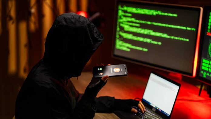 The weakest point in financial security may not be a <a href="https://www.thestreet.com/personal-finance/schwab-just-launched-a-brokerage-account-for-teenagers">brokerage account</a> password but a far less obvious vulnerability.<a href="https://investor.vanguard.com/investor-resources-education/article/how-scammers-exploit-investor-emotions">Vanguard warned</a> in a recent report that modern fraudsters exploit fear, urgency, and romantic trust to override rational thinking in investors. The firm's behavioral economics team identified the specific psychological traps that make even experienced investors vulnerable to targeted emotional manipulation.U.S. consumers reported a record $15.9 billion in <a href="https://www.thestreet.com/crypto/markets/fbi-reports-22-rise-in-crypto-fraud-losses-in-2025">fraud losses</a> in 2025, up from $12.5 billion in 2024, according to <a href="https://www.ftc.gov/system/files/ftc_gov/pdf/ftc-testimony-jec-hearing-on-the-rising-scam-economy.pdf">Federal Trade Commission data</a> disclosed in March 2026 congressional testimony.Adults aged 60 and older filed more than 201,000 complaints and reported $7.7 billion in losses in 2025, a 37% jump in complaints and about 59% higher losses than in 2024, the Federal Bureau of Investigation's 2025 <a href="https://www.ic3.gov/AnnualReport/Reports/2025_IC3Report.pdf">Internet Crime Complaint Center</a> Annual Report showed.How scammers hijack the brain's natural defensesHuman brains are wired to process emotions before logic, and scammers exploit this biological sequence to manipulate financial decisions, Andy Reed, Vanguard Head of Behavioral Economics Research, explained in the <a href="https://investor.vanguard.com/investor-resources-education/article/how-scammers-exploit-investor-emotions">Vanguard report</a>. Two competing systems shape financial decisions: a fast emotional process and a slower rational one that evaluates risk. Because the emotional response activates first, criminals can exploit the brief window before rational thinking overrides the initial impulse, the report indicated.A threatening email he received included a photograph of his home and demanded money, triggering an immediate visceral panic response, Reed said.He eventually recognized it as a mass-market scam built from publicly available data, but the initial panic was the exact response criminals engineered.Crossover fraud schemes combine tactics over months to steal billionsA <a href="https://corporate.vanguard.com/content/corporatesite/us/en/corp/articles/spotting-stopping-more-sophisticated-scams.html">Vanguard analysis</a>, "Spotting and stopping more sophisticated scams," describes how criminals blend multiple fraud techniques into elaborate schemes that unfold across weeks, months, or years.In a typical scheme, the fraudster initiates contact through an unsolicited pop-up window, phishing email, or social media message before escalating the attack.<strong>More Vanguard:</strong><a href="https://www.thestreet.com/retirement/vanguard-names-401k-oversights-that-hurt-your-retirement"><strong>Vanguard names 401(k) oversights that hurt your retirement</strong></a><a href="https://www.thestreet.com/retirement/vanguard-drops-playbook-on-retirement-income"><strong>Vanguard drops playbook on retirement income</strong></a><a href="https://www.thestreet.com/retirement/vanguard-warns-workers-are-losing-thousands-in-401k-savings"><strong>Vanguard warns workers losing thousands in 401(k)s</strong></a>The victim is then transferred to accomplices impersonating fraud investigators from banks, the Federal Bureau of Investigation, or the <a href="https://www.thestreet.com/personal-finance/treasury-warning-ai-cybersecurity-threat-to-your-bank-account">U.S. Treasury</a>, the firm explained. Investment scams continued to top all fraud categories by total dollar losses, with consumers reporting over $7.9 billion lost to such schemes in 2025, according to the FTC testimony before the Joint Economic Committee.The criminals behind crossover schemes are calculated and relentless, Vanessa Richards, global head of Vanguard Fraud Prevention and Physical Security, warned."The reality is that these scammers are con artists who prey on the victims' fears and needs in persuading them to act," Richards said.
Scammers mix phishing, fake investigators, and investment fraud into long-term schemes that stole over $7.9 billion from victims in 2025.<a href="https://www.gettyimages.com/detail/photo/hacker-making-voice-phishing-scam-call-using-laptop-royalty-free-image/2246589676?phrase=A%2520scammer%2520with%2520laptop%2520and%2520phone&searchscope=image,film&adppopup=true">Witthaya Prasongsin/Getty Images</a>
Older investors face the steepest financial toll from scam artistsBaby boomers hold more than $85 trillion in combined wealth, making them a prime target for scammers, Reed explained. <a href="https://www.thestreet.com/personal-finance/house-passes-bill-freeze-suspicious-senior-withdrawals">Seniors</a> often face heightened vulnerability because loneliness, particularly after losing a loved one, creates a powerful emotional need for social connection, John Ginelli, Vanguard Head of Investor Protection, noted in the report.Older Americans frequently treat money as deeply private, making them less likely to alert family members when suspicious strangers initiate contact, Reed noted. "Criminals know that when we're faced with a situation that puts us into a heightened emotional state, our brains are wired to act and not to stop and think logically," <a href="https://afro.com/aarp-fraud-watch-network/">said Kathy Stokes</a>, director of fraud prevention programs with the AARP Fraud Watch Network. Guilt and shame after victimization create a second crisis because the emotional toll can be more devastating than the financial damage itself, Ginelli warned. Unreported cases also prevent law enforcement from identifying trends that could help stop future fraud schemes targeting older investors, Ginelli added.Secrecy gives criminals time to drain every available resourceScammers deliberately isolate victims from their families and financial institutions, using enforced secrecy to prevent outside intervention before funds are transferred, the report indicated. Reed shared a personal story about his 102-year-old grandfather, who was targeted by multiple scammers a few years ago. Reed's family still does not know how many scams the grandfather fell for or how much money he lost, Reed said.The criminals coached his grandfather to purchase a burner phone and make cash drops, all while demanding he keep every detail hidden from family. Reed's family attempted to intervene, but his grandfather trusted the scammers over his own wife, son, and grandson because of the depth of manipulation.FBI Special Agent Ron Miller, assigned to the Washington Field Office, worked a case in which the victim was a criminology professor with extensive knowledge of victimology, according to a May 2026 <a href="https://www.fbi.gov/news/stories/scammers-target-older-adult-victims">FBI News report</a>.<blockquote>Almost anyone can be a victim. These guys are just that good</blockquote>Criminals are patient and will use every available resource to convince victims to take out loans, max out <a href="https://www.thestreet.com/personal-finance/best-moves-for-credit-cards-in-2026">credit cards</a>, and accumulate debt, Ginelli stressed.Red flags Vanguard says investors should watch forVanguard says the clearest red flags are pressure to act quickly, requests to keep a transaction secret, and instructions to move money into cash or cryptocurrency. The firm adds that Vanguard will never ask clients to keep a transaction secret from family or be dishonest about it.That advice is not unique to Vanguard. <a href="https://afro.com/aarp-fraud-watch-network/">The AARP Fraud Watch Network</a> also urges investors to pause before responding and independently verify suspicious contacts. Rather than using the phone number, email, or link provided in a message, investors should contact the financial institution directly.<strong><a href="https://www.thestreet.com/personal-finance/ftc-survey-older-americans-getting-hammered-by-scams">Related: FTC survey: Older Americans getting hammered by scams</a></strong>