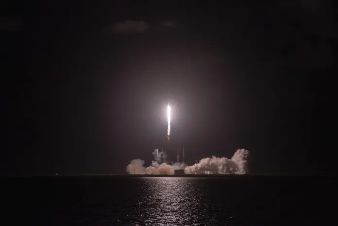SpaceX vs Honeywell Aerospace looks like the easiest pairing in space stocks: the rocket company for growth, the avionics maker for safety. The filings say the risk sits somewhere else. Honeywell Aerospace (HONA) has already been marked down 25.5% since its first regular-way session on 29 June and trades at about 15 times this year's guided adjusted EBIT on an enterprise-value basis. SpaceX (SPCX) has to lift December revenue to roughly 3.2 times its second-quarter monthly rate to reach the $100bn annualised run-rate management has promised, while up to about 4bn more shares become transferable by June 2027. On Monday 14 September SPCX closed at $148.15 and HONA at $164.08, according to <a href="https://stockanalysis.com/stocks/spcx/">stockanalysis.com</a>. Our 12-month base cases: HONA $195, or +19%, and SPCX $165, or +11%.
Monday's tape gave the clearest tell. Before the open, Melius Research cut five aerospace names to Hold, trimming its HONA target from $216 to $190, and HONA traded more than 3% lower pre-market, <a href="https://finance.yahoo.com/markets/stocks/articles/5-aviation-stocks-slide-melius-121723359.html">Yahoo Finance reported</a>. It opened at $154.00 and closed up 3.68%. The other four downgraded names all closed lower: GE Aerospace -1.88%, HEICO -3.88%, TransDigm -2.55% and Woodward -3.73%. HONA was the only one to finish green. A stock that absorbs a guidance cut, an S&P 100 exit and a downgrade inside six weeks and still finds buyers is trading like a de-risked value name. SPCX, meanwhile, is priced at 19.5 times a revenue run-rate it has not yet reached. That asymmetry, not rockets versus avionics, drives our verdict.
<strong>Key facts: SpaceX vs Honeywell Aerospace</strong>
SPCX closed at $148.15 on 14 Sep 2026, 9.7% above its $135.00 IPO price and 36.8% above its 5 Aug low close of $108.27. <a href="https://www.sec.gov/Archives/edgar/data/1181412/000162828026052535/spcx-20260630.htm">SpaceX 10-Q, Aug 2026</a>; <a href="https://stockanalysis.com/stocks/spcx/history/">stockanalysis.com</a>
SpaceX Q2 2026 revenue was $7,814m (+92%), with a $541m net loss and $18,369m of capex, 235% of revenue. <a href="https://www.sec.gov/Archives/edgar/data/1181412/000162828026052515/earningsreleaseq22608042.htm">SpaceX Q2 release, 4 Aug 2026</a>
HONA Q2 sales were $4,522m (+5%) and backlog $18.2bn (+9%); full-year organic growth guidance was cut to 4-5% from 7-9%. <a href="https://www.sec.gov/Archives/edgar/data/2089271/000208927126000020/exhibit991q22026earningsre.htm">HONA Q2 release, 5 Aug 2026</a>
HONA fell 23.2% on 6 Aug, the first session after that cut ($203.64 to $156.47). <a href="https://stockanalysis.com/stocks/hona/history/">stockanalysis.com</a>
Up to about 4.02bn SPCX Class A shares, 29.6% of the 13.57bn outstanding, become transferable between 24 Sep 2026 and 12 Jun 2027, before Elon Musk's 6.4bn. <a href="https://www.sec.gov/Archives/edgar/data/1181412/000162828026042639/spaceexplorationtechnologi.htm">SpaceX prospectus, 12 Jun 2026</a>
HONA's board authorised a $3.5bn buyback on 23 Jul, equal to 6.7% of its $52.0bn market value. <a href="https://www.sec.gov/Archives/edgar/data/2089271/000208927126000020/hona-20260723.htm">HONA 8-K, 5 Aug 2026</a>
Average 12-month analyst targets: SPCX $220.68 across 36 analysts, HONA $213 across 15. <a href="https://stockanalysis.com/stocks/spcx/forecast/">stockanalysis.com SPCX</a>; <a href="https://stockanalysis.com/stocks/hona/forecast/">HONA</a>, 15 Sep 2026
SpaceX vs Honeywell Aerospace: two very different ways to own space
The two tickers get filed together as space stocks, but space is a different share of each business. SpaceX reported three segments in the second quarter: Space revenue of $962m, Connectivity (Starlink) of $4,291m and AI of $2,561m, per its <a href="https://www.sec.gov/Archives/edgar/data/1181412/000162828026052515/earningsreleaseq22608042.htm">Q2 release</a>. The launch business itself lost $542m at the operating line as Starship spending rose. Starlink carried the quarter, doubling subscribers to 12.0m year on year, although average revenue per user fell to $66 a month from $85. And of the $18.4bn SpaceX spent on capex in the quarter, $15.8bn went to AI compute.
Honeywell Aerospace is a supplier to the whole flying fleet. Its Q2 sales split into $2,026m of commercial aftermarket (+8%), $679m of commercial original equipment (+6%) and $1,817m of defence and space (+3%), according to the <a href="https://www.sec.gov/Archives/edgar/data/2089271/000208927126000020/exhibit991q22026earningsre.htm">company's release</a>. Space is a slice of that third bucket, not the core. Full-year 2025 sales were $17,404m, of which $4,604m came from the US government, per the <a href="https://www.sec.gov/Archives/edgar/data/2089271/000162828026043193/exhibit991-informationstat.htm">spin-off information statement</a>.
A plain-language analogy helps. SpaceX is building a utility-scale network (satellites, launch capacity, data centres) and financing it like a growth company, with a $25bn bond issue and $85.7bn of IPO proceeds. HONA is closer to a toll road: 45% of Q2 sales came from the aftermarket, meaning parts and repairs on aircraft already flying. Toll roads rarely double, and they also rarely need December to be 3.2 times better than June.
One data trap is worth flagging for anyone screening HONA. Quote screens show a 52-week high of $297.50. That was a when-issued trade on 16 June on just 7,321 shares, before the stock existed as a standalone listing. Honeywell distributed one HONA share for every two HON shares held at the 15 June record date, and regular-way trading began on 29 June, with a first close of $220.19. Measured from $297.50 HONA looks 45% below its high; measured from its first real session it is 25.5% lower. We covered the standalone thesis in our <a href="https://financefeeds.com/honeywell-aerospace-hona-stock-prediction-250-bull-118-bear/">Honeywell Aerospace HONA stock prediction</a> on 7 August and SpaceX in our <a href="https://financefeeds.com/spacex-spcx-stock-prediction-215-bull-90-bear/">SPCX stock prediction</a> on 24 August.
The reset that explains most of HONA's slide came with its first quarterly report as a public company. Jim Currier, Chief Executive Officer at Honeywell Aerospace, framed it in the <a href="https://www.sec.gov/Archives/edgar/data/2089271/000208927126000020/exhibit991q22026earningsre.htm">Q2 release</a>: "For the second half of 2026, we believe it is prudent to align our guidance to our supply chain's demonstrated capabilities at the end of the second quarter."
How management and the Street have responded
SpaceX has answered its critics with a single number. On the 4 August call, Chief Financial Officer Bret Johnsen said the company was on "a trajectory, including contribution from Cursor, to reach $100 billion of ARR, or annualized revenue run rate, by the end of this year, based on our expected revenue in the month of December of this year," according to the <a href="https://s21.q4cdn.com/184289198/files/doc_financials/2026/q2/SpaceX-Q2-2026-Earnings_Transcript-FINAL.pdf">edited transcript</a>. He cited $6.7bn of cloud services revenue contracted in the first weeks of the third quarter, spread over six months from October. SpaceX also closed its Cursor acquisition on 14 August, issuing 389.3m Class A shares at an implied $60.0bn equity value, per its <a href="https://www.sec.gov/Archives/edgar/data/1181412/000162828026056945/spcx-20260814.htm">8-K</a>.
The contracts behind that target are large and short-dated in a legal sense. The prospectus says Anthropic agreed to pay $1.25bn a month through May 2029 for access to about 325,000 Nvidia GPUs, but "after the initial three-month period, the agreements may be terminated by either party upon 90 days' notice." The 10-Q adds that one AI customer, Customer B, supplied 19.5% of consolidated Q2 revenue. On 14 September Bernstein's Douglas Harned lifted his SPCX target to $248 from $239, while MoffettNathanson's Julie Zhu, rated Hold, moved to $142 from $131, per <a href="https://stockanalysis.com/stocks/spcx/forecast/">stockanalysis.com</a>. The spread of published targets, $117 to $450, is itself a measure of how little anyone can model December.
Honeywell Aerospace's response has been operational and financial. It says it is qualifying more than 50 new suppliers, with 50 more due in the second half, raising supplier tooling spend 20% in the second half versus the first and doubling it from 2025 to 2027, with about 70% going to castings. It has booked $15bn of estimated lifetime-value wins so far this year, led by IndiGo's selection of its avionics and power systems for 810 Airbus A320neo-family aircraft. On capital, the board authorised the $3.5bn buyback, and S&P Dow Jones Indices is removing HONA from the S&P 100 before the open on 21 September, as we <a href="https://financefeeds.com/four-it-names-join-as-nike-honeywell-aerospace/">reported on 8 September</a>.
The Street is split rather than hostile. Morgan Stanley's Kristine Liwag upgraded HONA on 19 August with a $205 target, a day the stock rose 6.0%. J.P. Morgan's Seth Seifman holds a $235 target on a Hold rating, Jefferies' Sheila Kahyaoglu $175, and Melius' Scott Mikus now $190. For SpaceX, the demand-side conviction is not in doubt; the cap table is. Saudi Arabia's PIF alone held $26.3bn of SPCX at the 30 June close, as <a href="https://financefeeds.com/saudi-pif-26-3-billion-spacex-stake/">we detailed last week</a>. Elon Musk, Chief Executive Officer at SpaceX, left no room for hedging on the call: "To be clear, the $100 billion ARR in December is not a question mark. That's what we'd achieve if we basically did nothing."
The numbers side by side
Having tracked SPCX on these pages since its June debut, the one ratio we keep returning to is price against the run-rate it is promising. At $148.15, SpaceX's 13.57bn shares (7.70bn Class A and 5.49bn Class B on the 10-Q cover, plus 391m issued for Cursor) are worth $2.01tn. Adding $39.4bn of debt and finance leases and subtracting $100.0bn of cash and marketable securities at 30 June gives an enterprise value near $1.95tn. That is 62 times annualised Q2 revenue and 19.5 times the $100bn December run-rate. Honeywell Aerospace, at $164.08 and 316.95m shares, is worth $52.0bn; with $15.85bn of long-term debt and $1.06bn of cash, its enterprise value is about $66.8bn, or 3.7 times trailing twelve-month sales of $17.9bn.
SPCX and HONA rebased to 100 at HONA's first regular-way close on 29 June 2026. SPCX is down 9.8% over the period, HONA 25.5%. Source: stockanalysis.com daily closes; chart by FinanceFeeds.
MetricSpaceX (SPCX)Honeywell Aerospace (HONA)
Close, 14 Sep 2026$148.15$164.08
Change since 29 Jun close-9.8%-25.5%
Market value / enterprise value$2.01tn / ~$1.95tn$52.0bn / ~$66.8bn
Q2 2026 revenue (y/y)$7,814m (+92%)$4,522m (+5%)
Q2 GAAP net income-$541m$256m
Q2 adjusted profit measureAdj. EBITDA $3,538mAdj. EBIT $995m
H1 2026 free cash flow-$25.0bn ($3.5bn OCF less $28.5bn capex)$86m; H2 guide $1.0-1.5bn
Valuation62x annualised Q2 revenue; 19.5x $100bn ARR target15.2x FY26 adj. EBIT guide; 21.2x FY26 adj. EPS guide
Share supply, next 12 monthsUp to ~4.0bn shares unlock (ex-Musk)$3.5bn buyback authorised
Average analyst target$220.68 (+49%)$213 (+30%)
Two pieces of arithmetic reframe the table. First, HONA's own 2030 targets, set out at its 3 June investor day as 6-8% organic sales growth a year, adjusted EBIT above $6.5bn and free cash flow above $4bn, per <a href="https://www.tipranks.com/news/the-fly/honeywell-aerospace-target-6-8-organic-sales-cagr-to-2030-thefly-news">TheFly</a>, put today's enterprise value at 10.3 times 2030 EBIT and today's market value at a 7.7% yield on 2030 free cash flow. Currier said in August the company is "committed to delivering on the 2030 targets laid out at Investor Day in June." The market is pricing heavy doubt about that commitment.
Second, SpaceX's $100bn December target implies $8.33bn of revenue in a single month. Q2 averaged $2.60bn a month. The disclosed step-ups (Anthropic moving to its full $1.25bn monthly fee after a reduced-fee ramp, the $6.7bn cloud contracts from October and Cursor) help, but SpaceX has not itemised the rest. Musk's claim that $100bn arrives "if we basically did nothing" can be tested in one place: the Q4 report, which will show December revenue.
Structural tension: share supply, leverage and index rules
SpaceX's lock-up calendar is the biggest structural difference between the two stocks. Under the <a href="https://www.sec.gov/Archives/edgar/data/1181412/000162828026042639/spaceexplorationtechnologi.htm">prospectus schedule</a>, up to 319.0m shares were released on 9 September and up to 59.1m affiliate shares on 10 September. Next come up to 328.4m shares each on 24 September, 9 October and 24 October, up to 1.3bn shares two trading days after Q3 results, and a final 180-day tranche on 8 December of up to 328.4m or 797.6m, depending on whether "Additional Release Shares" were freed at the Q3 release. An extended lock-up then releases about 1.4bn more in stages through 12 June 2027, the day Musk's 6.4bn shares also come out of lock-up. Transferable is not the same as sold, and Musk has given no indication he intends to sell. Still, up to roughly $596bn of stock at Monday's price is scheduled to become sellable in nine months.
Leverage cuts the other way. SpaceX ended June with $39.4bn of debt and finance leases, including $13.3bn owed to related parties, on which it paid $327m of related-party interest in Q2, per the release. That is modest against $100bn of cash, but the cash is being spent at a rate of $28.5bn of capex in six months. HONA's balance sheet was built for the spin: it raised $15.8bn of long-term debt in the first half and made $15.1bn of net transfers to its former parent, leaving a $5.6bn equity deficit. On our rough EBITDA estimate (guided EBIT plus annualised depreciation and amortisation, about $4.9bn), net debt of $14.8bn is about 3.0 times. That caps how fast the $3.5bn buyback can run.
Index rules add a flow question to both stocks. SpaceX's filed first-half net loss of $4.8bn keeps it outside S&P 500 eligibility, which requires positive GAAP earnings over the trailing four quarters and the latest quarter under the <a href="https://www.spglobal.com/spdji/en/documents/methodologies/methodology-sp-us-indices.pdf">S&P US indices methodology</a>. HONA faces the opposite flow on 21 September as S&P 100 trackers sell. Government exposure also matters. SpaceX won more than $6bn of multi-year Starshield contracts in Q2, and HONA's defence and space sales were hurt by "the wind-down of a restricted government program." Rocket Lab offers a smaller-cap comparison on launch economics, set out in our <a href="https://financefeeds.com/rocket-lab-rklb-stock-prediction-104-bull-76-base-41-bear/">RKLB stock prediction</a>.
The sector-level warning came from Melius on Monday, which said "several years of robust" aftermarket growth may be ending, moderating to the "high-single-digit percentage range" next year, per <a href="https://finance.yahoo.com/markets/stocks/articles/5-aviation-stocks-slide-melius-121723359.html">Yahoo Finance</a>. For HONA, where the aftermarket is 45% of sales, that is the single most important variable in 2027.
The call: 12-month targets for SPCX and HONA
These are our scenario levels to September 2027, set against the 14 September closes. They are analysis, not a recommendation.
SpaceX (SPCX)TargetFrom $148.15ProbabilityWhat has to happen
Bull$240+62%25%December revenue at or above $8.33bn, Starship V3 flying operational Starlink satellites, unlocks absorbed. About 32x a $100bn run-rate.
Base$165+11%45%Run-rate lands near target, but up to 4bn shares of supply holds the multiple near 22x.
Bear$95-36%30%A large cloud customer uses its 90-day exit or December misses by $20bn+ of run-rate; about 12x.
Honeywell Aerospace (HONA)TargetFrom $164.08ProbabilityWhat has to happen
Bull$225+37%25%Q3 shows output recovering, the 2027 outlook fits the 6-8% path and the buyback starts. About 19.6x FY26 adj. EBIT.
Base$195+19%50%The reset FY26 guidance holds; 17.4x EBIT, about 25x the $7.75 EPS midpoint.
Bear$135-18%25%A second cut at Q3 as aftermarket growth slows; 13.1x EBIT.
Probability-weighted, SPCX comes to $162.75, a 9.9% expected return, and HONA to $187.50, or 14.3%. HONA's downside in the bear case is half as deep as SPCX's (-18% against -36%), and its upside-to-downside ratio is 2.1 against 1.7. On a risk-adjusted basis, and on a probability-weighted basis, Honeywell Aerospace offers the higher 12-month return. SpaceX has the higher ceiling: if the $100bn run-rate arrives on time and the unlock supply is absorbed, +62% beats anything we can construct for HONA. Both of our base cases sit below the analyst averages, because we discount SPCX for supply and HONA for execution.
We have also cut our own HONA bull case, from $250 on 7 August to $225, because the premise changed when management lowered 2026 guidance. What would change the verdict: evidence at SpaceX's Q3 report that AI revenue is stepping up fast enough to make $8.33bn in December visible, or a second HONA guidance cut, which would move our HONA base case toward $150. For a long-horizon comparison of SpaceX against a non-equity asset, see our <a href="https://financefeeds.com/spacex-or-btc-where-to-invest-for-higher-returns/">SpaceX or BTC analysis</a>.
FAQ
Is SpaceX or Honeywell Aerospace the better stock for higher returns?
On our 12-month scenarios, Honeywell Aerospace has the higher probability-weighted return, +14.3% against +9.9% for SpaceX, with a shallower bear case (-18% against -36%). SpaceX has the bigger upside, +62% in our bull case against +37% for HONA, but it depends on hitting a $100bn December run-rate while up to 4bn shares unlock.
Why did Honeywell Aerospace stock fall after the spin-off?
HONA's first quarterly report on 5 August cut 2026 organic growth guidance to 4-5% from 7-9% and pro forma adjusted EBIT to $4.35-4.45bn from $4.65-4.75bn, citing supply-chain limits. The stock fell 23.2% the next day and is 25.5% below its first regular-way close of $220.19.
When do more SpaceX shares unlock?
The prospectus schedules up to 328.4m shares on each of 24 September, 9 October and 24 October, up to 1.3bn after Q3 results and a final 180-day tranche on 8 December. Extended lock-ups release about 1.4bn more through June 2027, when Elon Musk's 6.4bn shares also leave lock-up.
Is the $297.50 Honeywell Aerospace high real?
It was a when-issued trade on 16 June 2026 on only 7,321 shares, before regular-way trading. HONA began regular-way trading on 29 June after Honeywell distributed one share per two HON shares. The first regular-way close, $220.19, is the fairer reference for measuring HONA's performance as a standalone stock.
How much of Honeywell Aerospace is actually a space business?
Less than the "space stocks" label implies. Defence and space together were $1,817m, or 40% of Q2 sales, and the company does not split out space alone. The larger driver is the commercial aftermarket, $2,026m or 45% of the quarter, which is why a slowdown in aftermarket growth matters more to HONA than any launch schedule.
Is SpaceX profitable?
Not on a GAAP basis. SpaceX lost $541m in Q2 2026 and $4.8bn in the first half, although adjusted EBITDA was $3.5bn in the quarter. Capex of $28.5bn in the half left free cash flow at -$25.0bn, funded by $100bn of cash and marketable securities at 30 June.
<em>Disclaimer: This article is analysis for informational purposes and is not investment advice. Scenario levels and probabilities are FinanceFeeds estimates, not forecasts of certainty. Share prices are volatile and capital is at risk.</em>