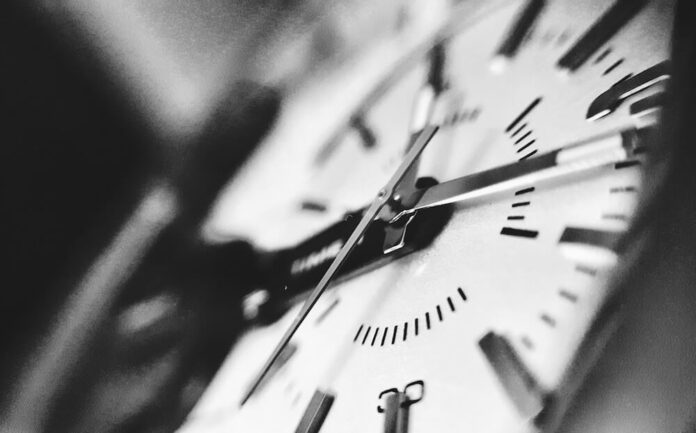 The GENIUS Act gave US regulators one year to turn Congress’s federal stablecoin framework into an operational rulebook. That deadline passed on July 18, 2026, with no final implementing regulations in place.
<a href="https://www.congress.gov/bill/119th-congress/senate-bill/1582/text">Section 13 of the GENIUS Act</a> directed every primary federal payment stablecoin regulator, the Treasury Department and each state payment stablecoin regulator to implement the law through notice-and-comment rulemaking within one year of enactment. President Donald Trump signed the Act on July 18, 2025, making July 18, 2026 the statutory deadline.
Nothing automatic happened when that date passed. Section 13 does not contain a penalty clause, substitute rules or an enforcement mechanism that completes the framework when regulators miss the timetable. The agencies remain responsible for finishing the work, while issuers continue preparing around proposals that can still change.
Regulators have produced a substantial body of draft regulation. Roughly ten proposed rules have emerged across the OCC, FDIC, Treasury, FinCEN, Federal Reserve and National Credit Union Administration, but none had been finalized by the deadline. The result is not a legal vacuum because the statute already establishes the broad regime. It is an implementation gap involving the capital, liquidity, redemption, licensing and financial-crime requirements companies will need to follow in practice.
What Section 13 Required by July 18
The GENIUS Act established the structure of the new regime in legislation. Payment stablecoins must generally be issued by permitted issuers, supported by eligible reserves and redeemable at a fixed monetary value. Issuers will face disclosure, supervisory, risk-management and financial-crime requirements, while digital asset platforms will eventually face restrictions on offering stablecoins that do not meet the federal framework.
Congress left regulators to determine how many of those requirements would operate. Section 13 required the relevant federal and state authorities to promulgate implementing regulations within one year. The requirement was therefore to complete appropriate rulemaking, not merely publish proposals or open consultations.
The distinction matters because a proposed regulation is not a final compliance standard. Capital formulas, reserve composition, liquidity thresholds, redemption procedures, application requirements and supervisory reporting can all change after agencies review public comments.
FinanceFeeds previously examined the <a href="https://financefeeds.com/us-treasury-commences-official-rollout-of-genius-act-stablecoin-framework/">Treasury rollout of the GENIUS Act framework</a>. The missed deadline now shows that the transition from legislation to enforceable supervision is taking longer than Congress prescribed.
Where the Main Regulators Stand
The Office of the Comptroller of the Currency issued a broad proposed rule on February 25 covering most of the regulations it must administer under the GENIUS Act. The proposal addresses eligible reserves, capital, liquidity, redemptions, risk management, audits, custody, applications, supervision and foreign issuers. The OCC said the remaining Bank Secrecy Act, anti-money laundering and sanctions provisions would be handled through separate coordinated rulemaking.
Under the OCC proposal, certain federally supervised nonbank stablecoin issuers would face a minimum capital floor of $5 million. For liquidity, the agency proposed two alternative approaches rather than a three-tier regulatory framework.
One is a principles-based option supported by a regulatory safe harbour. The other imposes quantitative reserve-liquidity requirements. Within that quantitative option, at least 10% of required reserve assets would have to be held in demand deposits or balances at a Federal Reserve Bank. Further portions would need to be available over longer periods, subject to maturity restrictions and a weighted-average-maturity limit.
The 10% figure is a reserve-composition requirement. It does not require issuers to redeem 10% of outstanding stablecoins on the same business day.
The OCC separately proposed a general two-business-day redemption standard. When redemption requests exceed 10% of an issuer’s outstanding stablecoin value during a 24-hour period, the permitted window would extend to seven calendar days. The distinction matters because the threshold provides extra time during unusually large redemption events rather than imposing faster redemptions.
The FDIC proposed a similar prudential framework for issuers connected to institutions under its supervision. Its April rule covers reserves, capital, risk management, custody and redemption, and would also generally require stablecoins to be redeemed within two business days.
Treasury has proposed rules addressing state regulatory regimes and illicit-finance obligations. Its state-regime process will determine whether a state framework is substantially similar to the federal system, a designation that can allow qualifying issuers with no more than $10 billion in outstanding payment stablecoins to remain primarily under state supervision.
FinCEN, the Federal Reserve, the OCC, the FDIC and the NCUA have also participated in joint proposed customer-identification requirements for stablecoin issuers. That consultation remains open until August 21, more than one month after the statutory implementation deadline.
The Federal Reserve and NCUA therefore remain part of the unfinished framework even though they have attracted less attention than the OCC and FDIC. Both are primary federal payment stablecoin regulators for entities within their respective jurisdictions, and both are participating in rule packages that had not become final by July 18.
The Missed Deadline Does Not Move the Effective Date
The GENIUS Act takes effect on the earlier of January 18, 2027, which is 18 months after enactment, or 120 days after the primary federal payment stablecoin regulators issue final regulations implementing the Act.
The missed rulemaking deadline therefore does not automatically give issuers more time. January 18 remains the statutory backstop. The delay instead reduces the period available between publication of the final rules and the date on which the federal regime becomes operative.
If the primary regulators had completed the rules substantially before September, the 120-day mechanism could have activated the Act before January 18. Final regulations issued after approximately September 20 would generate a 120-day date on or after the statutory backstop, making January 18 the earlier trigger.
The practical consequence is a compressed preparation period. Issuers may receive final details covering capital, reserve management, redemptions and supervision only weeks or months before they must begin operating under the regime.
Issuers Are Building Around Proposals
Stablecoin companies are not waiting for every regulation to be finalized. Existing issuers are adjusting reserve practices, compliance systems and corporate structures, while banks and crypto firms are developing products intended to fit the federal framework.
Tether launched <a href="https://financefeeds.com/tether-launches-usat-a-federally-regulated-dollar-stablecoin-for-u-s-users/">USA₮ through Anchorage Digital Bank</a> as a separate US-focused stablecoin rather than attempting to place its global USDT product directly inside the new system. The token’s supply later <a href="https://financefeeds.com/tethers-usa%E2%82%AE-supply-jumps-nearly-540-in-april/">rose nearly 540% in April</a>, providing an early indication of demand for products designed around US regulatory expectations.
Other firms must decide whether to seek federal approval, operate through a qualifying state regime or partner with an already regulated institution. Those decisions depend on unresolved questions involving capital calculations, reserve liquidity, custody, customer identification, redemption procedures and supervisory costs.
The Realistic Timeline Now
The likely outcome is a sequence of final rules over the remaining months of 2026 rather than one coordinated rulebook issued on a single date. Prudential requirements may be completed separately from customer-identification, sanctions and state-certification regulations.
The missed deadline does not invalidate the GENIUS Act, punish the agencies or fill the unfinished parts of the framework. It leaves companies preparing for a January 2027 backstop while several of the rules governing their operations remain provisional.
Congress has decided what the US stablecoin market should broadly look like. Regulators missed the deadline for explaining exactly how companies must operate inside it.