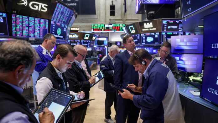 Michael Burry has spent the better part of this year picking apart Big Tech’s AI spending, one balance sheet at a time.
His newest warning goes further than any of his previous posts, arguing the entire industry is now repeating a pattern that has wrecked fortunes before.
The five companies at the center of his latest argument are Amazon, Meta, Alphabet, Microsoft and Oracle. Burry says the hundreds of billions they are spending will not show up as a problem for years. But when it does, it could hit hard.
<strong>Burry’s latest warning hits on Big Tech’s AI spending</strong>
In a<a href="https://michaeljburry.substack.com/p/capital-cycle-iq-and-the-forensic"> Substack</a> post published on September 24, Burry compared the current AI spending boom to past capital cycle bubbles, including the dot-com era. He pointed to net capital investment across S&P 500 companies reaching 2.07% of GDP. That is the highest level in roughly four decades outside the aftermath of the March 2000 Nasdaq peak.
Burry does not think the fallout from that spending shows up right away. He wrote that write-offs could emerge around 2028 or 2029, when he believes companies could face significant write-offs tied to the infrastructure they are building today,<a href="https://stocktwits.com/news-articles/markets/equity/michael-burry-warns-hyperscalers-are-hiding-3-trillion-in-ai-liabilities-and-wall-street-isn-t-looking-when-the-music-s-over/cZMRbsvRB4I"> Stocktwits reported.</a>
<strong>More Wall Street:</strong>
<a href="https://www.thestreet.com/investing/wall-streets-ai-trade-faces-its-biggest-valuation-test"><strong>Wall Street’s AI trade faces its biggest valuation test</strong></a>
<a href="https://www.thestreet.com/markets/wall-street-shift-technology-infrastructure"><strong>The next Wall Street shift is already underway</strong></a>
<a href="https://www.thestreet.com/investing/stocks/wall-street-sends-strong-verdict-bull-stock-market"><strong>Wall Street sends strong 4-word verdict on the stock market</strong></a>
Alphabet drew the sharpest attention in the post. Burry estimates the company is carrying nearly $900 billion in off-balance-sheet commitments and exposures, including purchase obligations and other financing-related exposures tied to its AI infrastructure buildout.
Meta was not far behind. Burry pegged the company’s uncommenced leases and purchase obligations at roughly $700 billion, with that figure potentially approaching $1 trillion as its broader future commitments are taken into account,<a href="https://stocktwits.com/news-articles/markets/equity/michael-burry-warns-hyperscalers-are-hiding-3-trillion-in-ai-liabilities-and-wall-street-isn-t-looking-when-the-music-s-over/cZMRbsvRB4I"> Stocktwits reported.</a>
<strong>The numbers behind the $3 trillion figure</strong>
Add it all up across Microsoft, Amazon, Alphabet, Meta and Oracle. Purchase commitments. Future leases. Guarantees backing third-party debt. Construction in progress. Various special purpose vehicles. Burry gets to roughly $3 trillion.
That spending shows no sign of slowing. Hyperscalers are on track to spend roughly $800 billion on capital expenditures this year. Combined annual spending is expected to cross $1 trillion in the year ahead. That pace keeps expanding the very commitments Burry is warning about, a dynamic he has described as leaving these liabilities in “hypergrowth mode,”<a href="https://www.thestreet.com/investing/stocks/michael-burry-sends-stark-warning-on-ai-hyperscalers"> according to TheStreet.</a>
This is not the first time Burry has raised concerns about how that spending gets accounted for. He has argued that hyperscalers are extending the useful life of Nvidia chips well beyond their realistic two to three year replacement cycle. He estimates that move could understate industry-wide depreciation by roughly $176 billion between 2026 and 2028,<a href="https://www.thestreet.com/investing/stocks/michael-burry-loud-signal-to-stock-market-investors-sp500-semiconductors-nvidia-palantir"> according to TheStreet.</a>
The earnings impact of that accounting choice, in Burry’s view, would not be evenly spread. He has estimated Oracle’s earnings could end up overstated by roughly 26.9% and Meta’s by about 20.8% by 2028, if the depreciation assumptions behind current reporting hold up.
Burry compared the current AI spending boom to past capital cycle bubbles, including the dot-com era.<a href="https://www.gettyimages.com/detail/2295046817">Bloomberg / Getty Images</a>
<strong>How Big Tech and Wall Street are responding</strong>
Nvidia sent a seven-page memo to Wall Street analysts and named Burry directly. Four to six years is the real GPU depreciation window, it said. The 2020 A100 is still running. Still getting paid for. Two to three years, Nvidia argued, is not the cycle.
Nvidia also disputed one of Burry’s specific figures, stating it has repurchased $91 billion worth of shares since 2018 rather than the $112.5 billion Burry cited, arguing he had incorrectly included taxes on restricted stock units in his calculation,<a href="https://www.thestreet.com/investing/a-buried-nvidia-warning-could-shake-the-entire-ai-buildout"> TheStreet reported.</a>
Micron’s chief business officer told investors on a recent earnings call that customer demand for memory chips remains well above the company’s ability to supply across nearly every product category through 2028. That runs directly counter to the idea that current AI demand reflects speculation rather than genuine need.
Burry has continued building short positions that reflect his broader thesis, including bets against Oracle, Nebius, Micron and Palantir. Most of those stocks posted gains through August. That creates a clear test of his timing as the AI trade keeps rallying.
<strong>What it means for investors</strong>
Burry’s argument rests on a specific historical pattern. He has pointed to the late 1990s technology, media and telecommunications boom. After that cycle ended, depreciation and write-downs pushed aggregate S&P 500 net investment below zero for 12 consecutive quarters between mid-2003 and mid-2006.
That history is why Burry considers 2027 through 2029 the critical window. That is when he expects the accounting to catch up with the spending. It also underpins his leveraged short on the Philadelphia Semiconductor Index through January 2027 put options.
The disagreement between Burry and the companies he is targeting is unlikely to resolve quickly. Nvidia’s public rebuttal, Micron’s supply-demand data and continued capacity expansion from chipmakers like Taiwan Semiconductor all suggest the market still sees real demand behind the spending.
Burry disagrees. He keeps building the case that a reckoning is coming once the accounting catches up with reality.
<strong><a href="https://www.thestreet.com/economy/michael-burry-wealth-transfer-economic-inequality">Related: Michael Burry’s blistering message on economic inequality</a></strong>